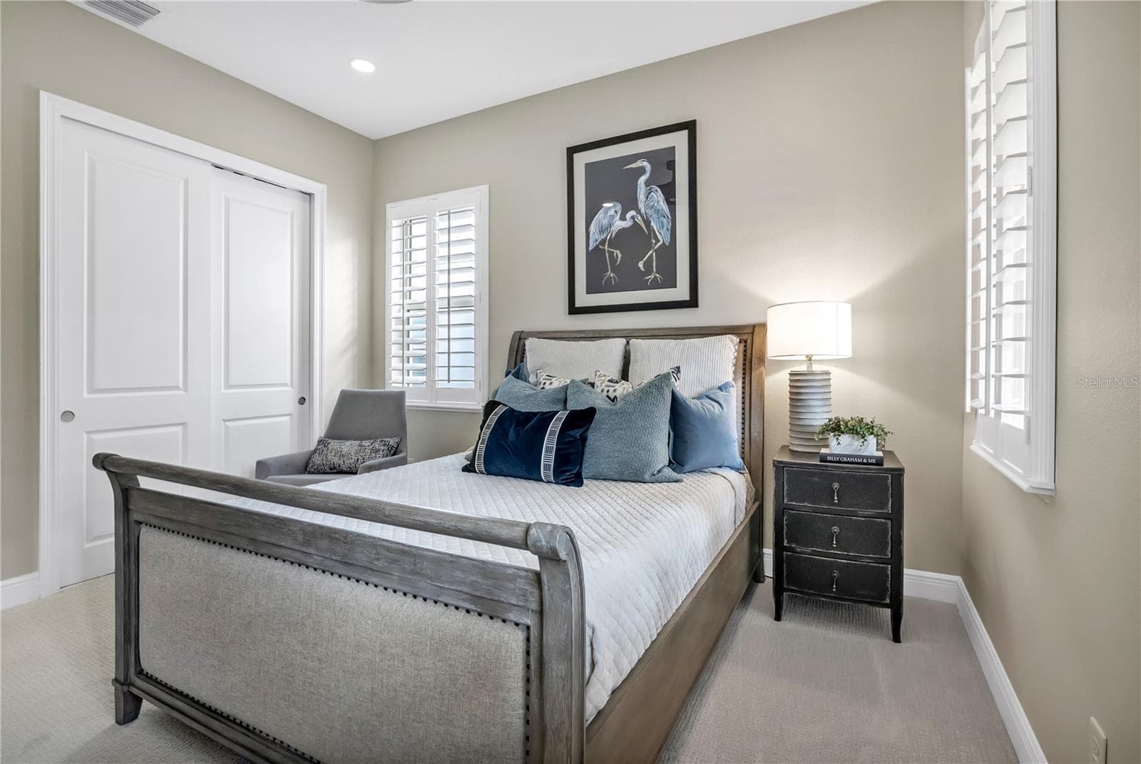 Additional view showcasing the bedroom's generous layout and closet space. - 15749 CUTTER SAIL PL, WINTER GARDEN
