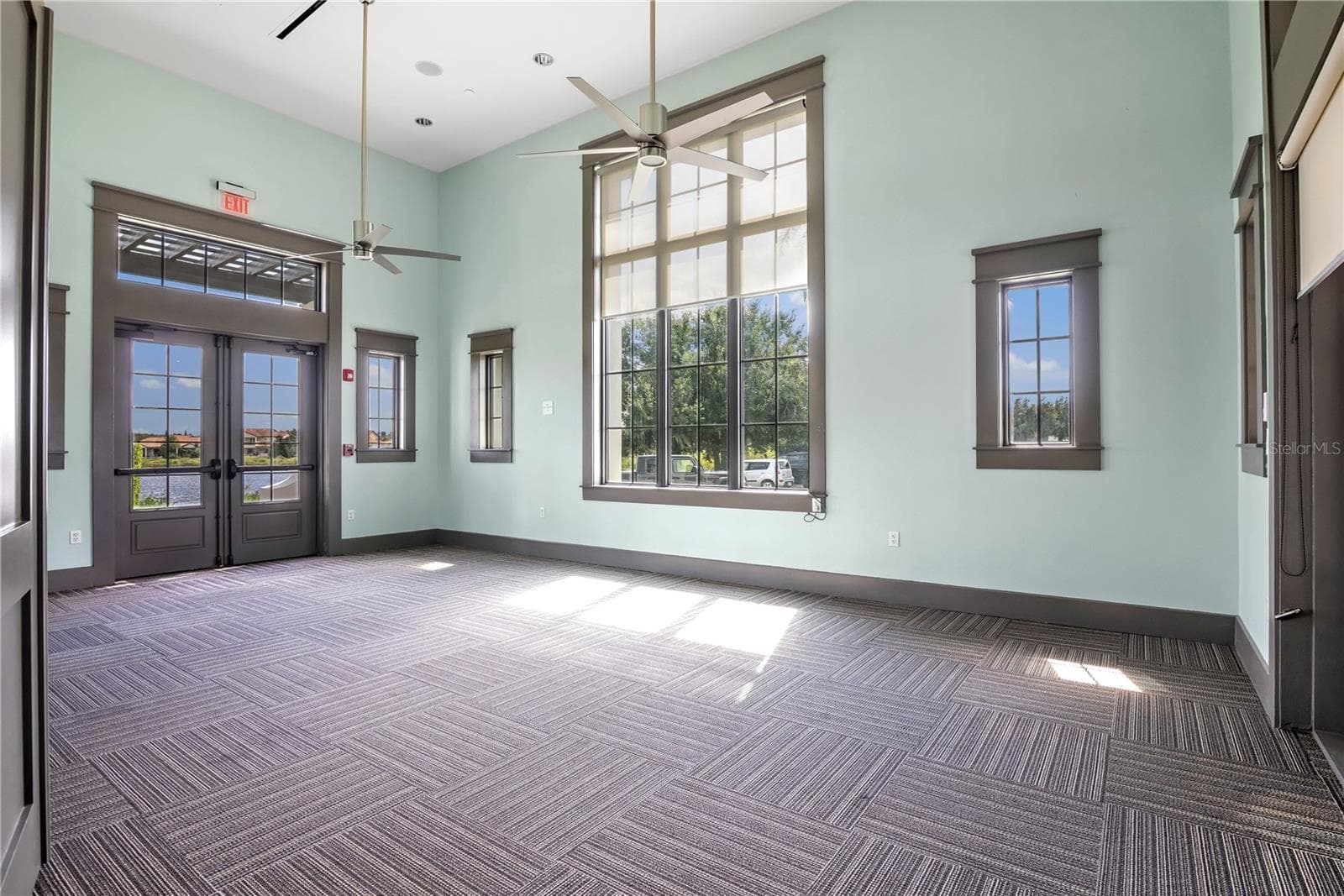 Dedicated yoga and wellness room offering a peaceful, inviting space for exercise, stretching, meditation, and relaxation. - 15749 CUTTER SAIL PL, WINTER GARDEN
