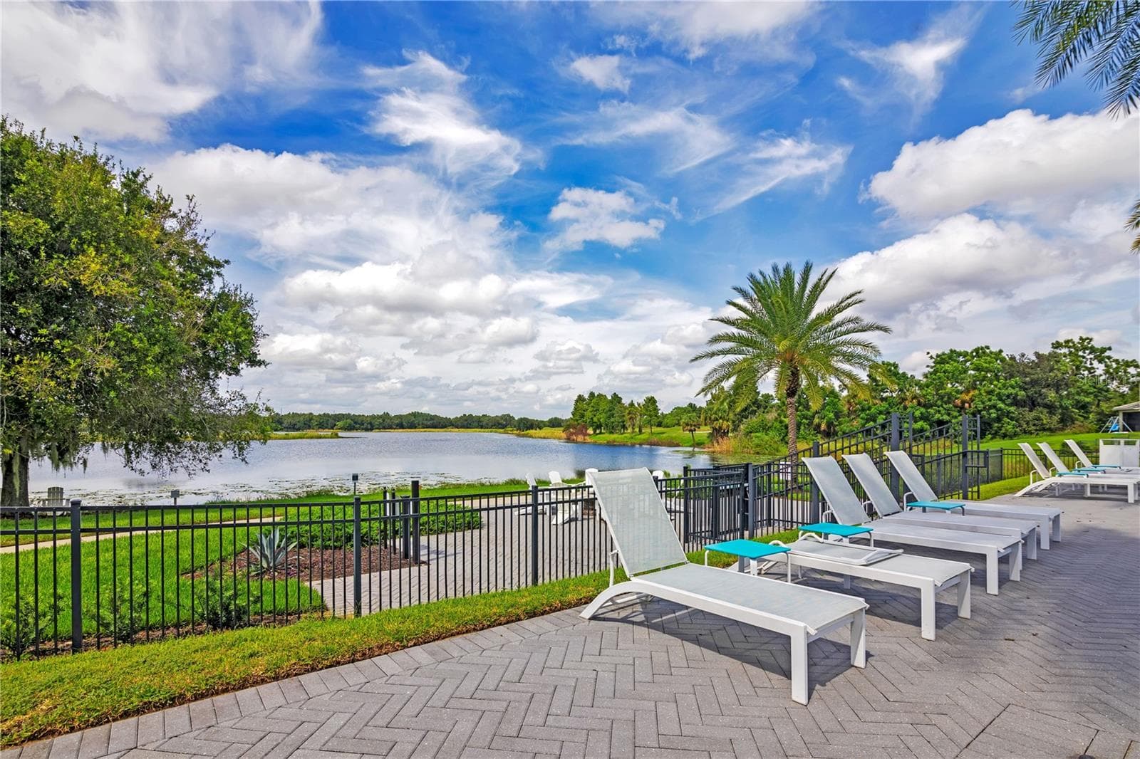 Enjoy picturesque lake views and the peaceful surroundings of the Lakeshore community. - 15749 CUTTER SAIL PL, WINTER GARDEN