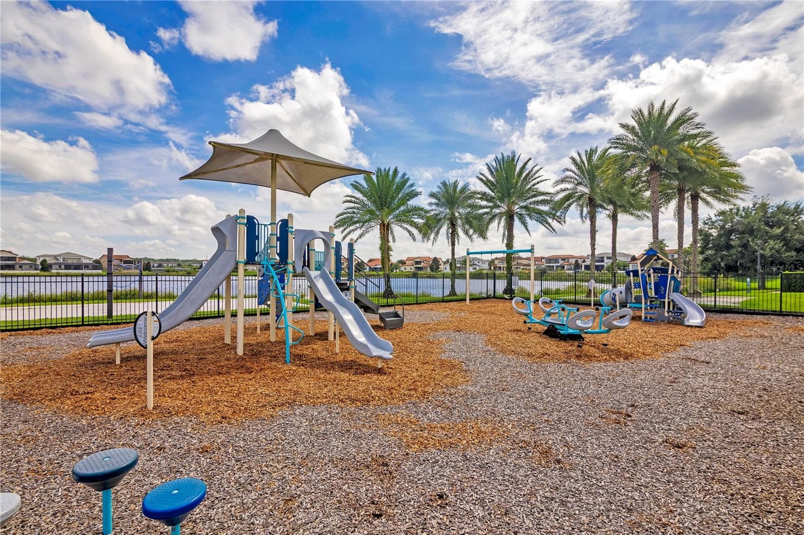 Community playground offering outdoor recreation in a beautifully maintained setting. - 15749 CUTTER SAIL PL, WINTER GARDEN
