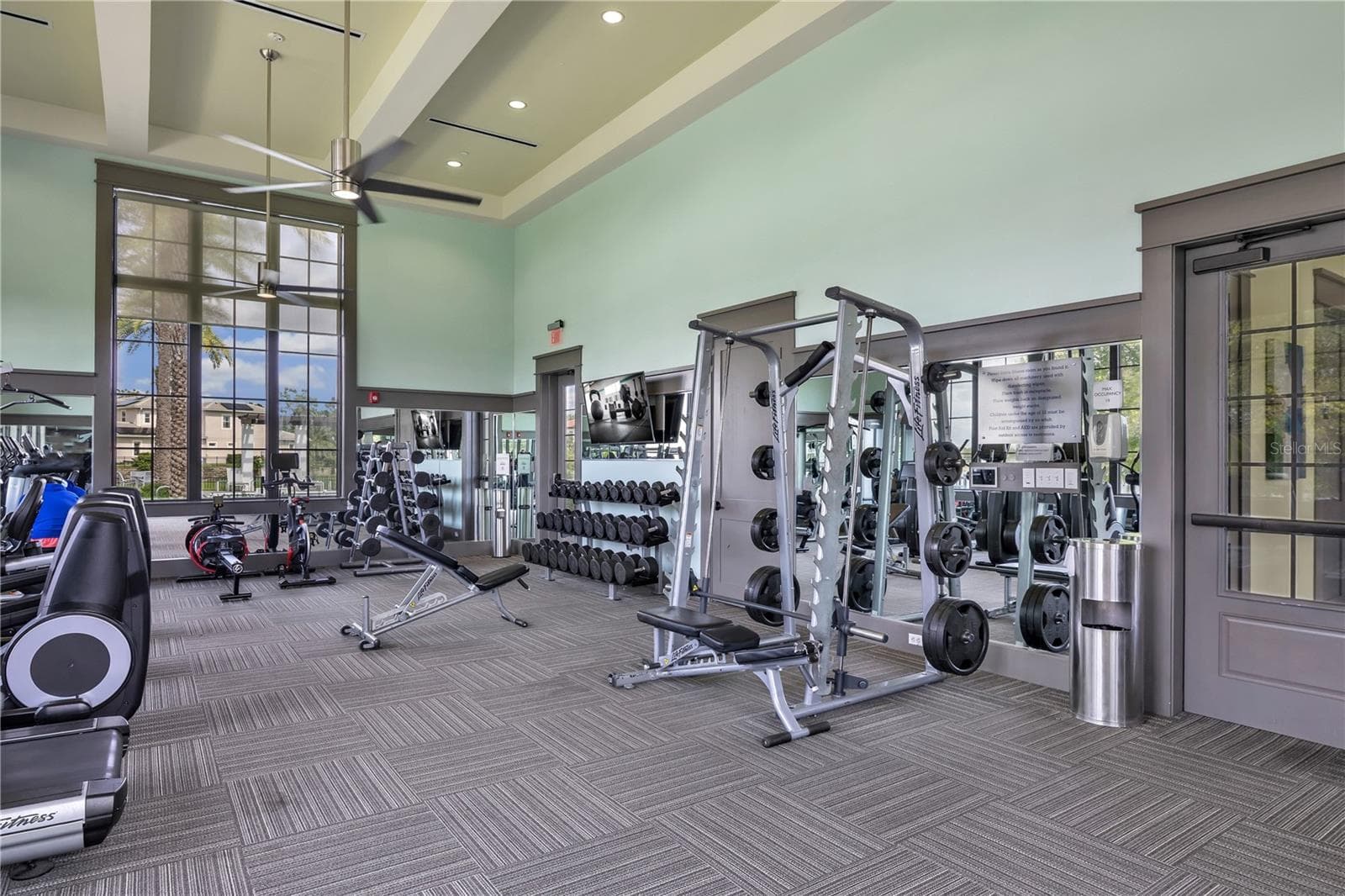 Additional view of the community fitness center and exercise equipment. - 15749 CUTTER SAIL PL, WINTER GARDEN