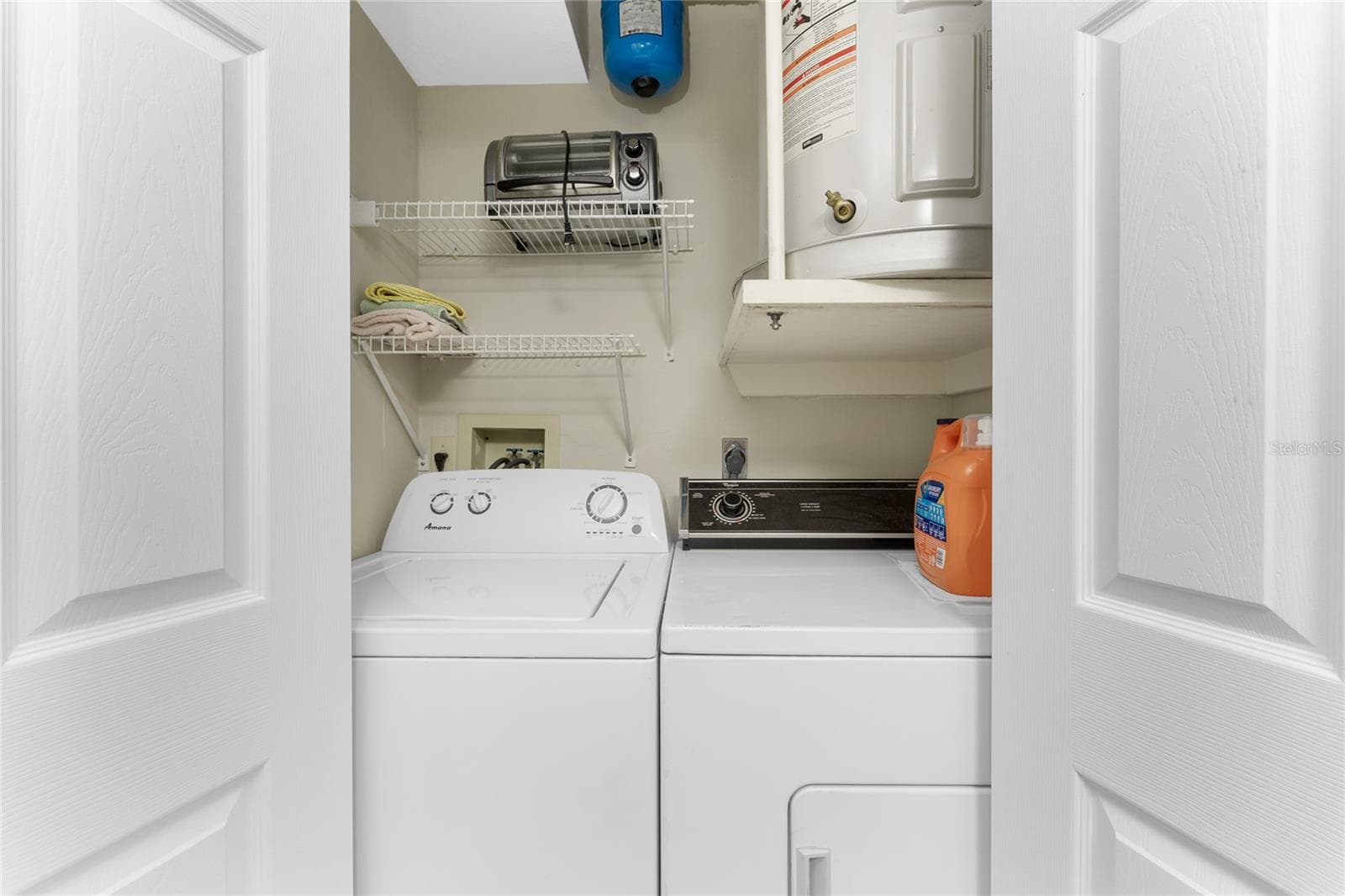 Laundry closet fits a full size washer and dryer - 6600 GASPARILLA PINES BLVD ##14-103, ENGLEWOOD