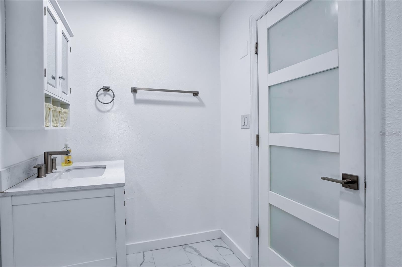 Fully renovated primary bathroom with new door - 4415 HAYLOCK DR, ORLANDO