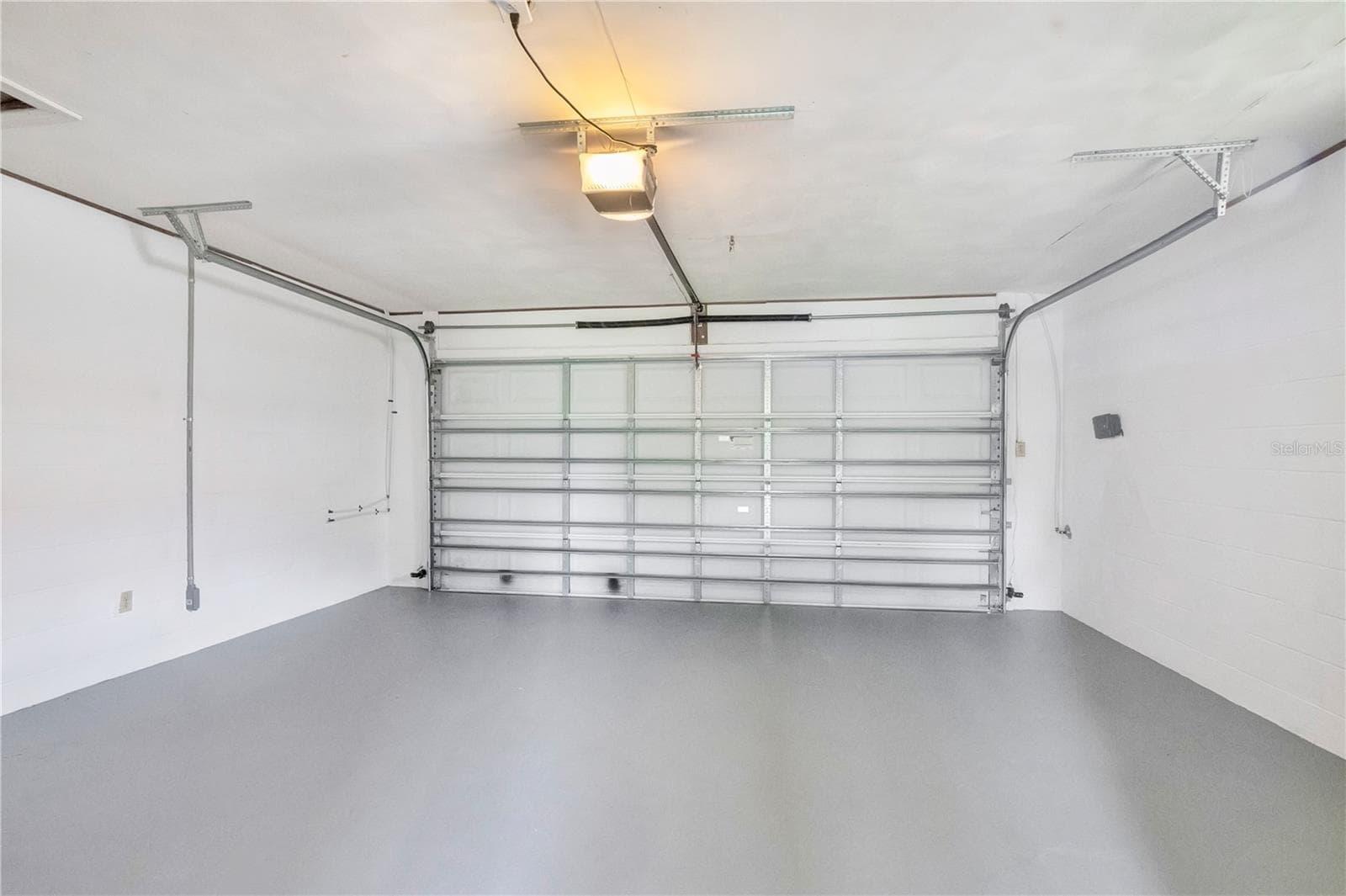 Two-car garage with separate workshop - 4415 HAYLOCK DR, ORLANDO