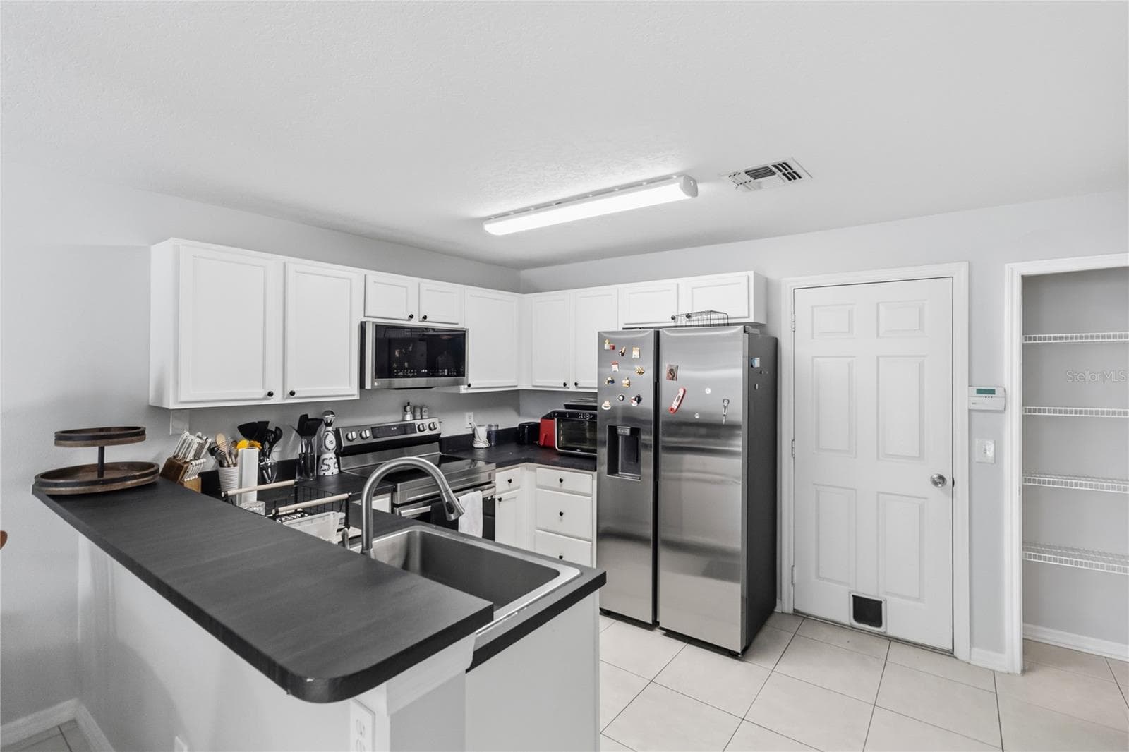 Townhouse at 13015 LEXINGTON SUMMIT ST, ORLANDO, photo 5 of 24