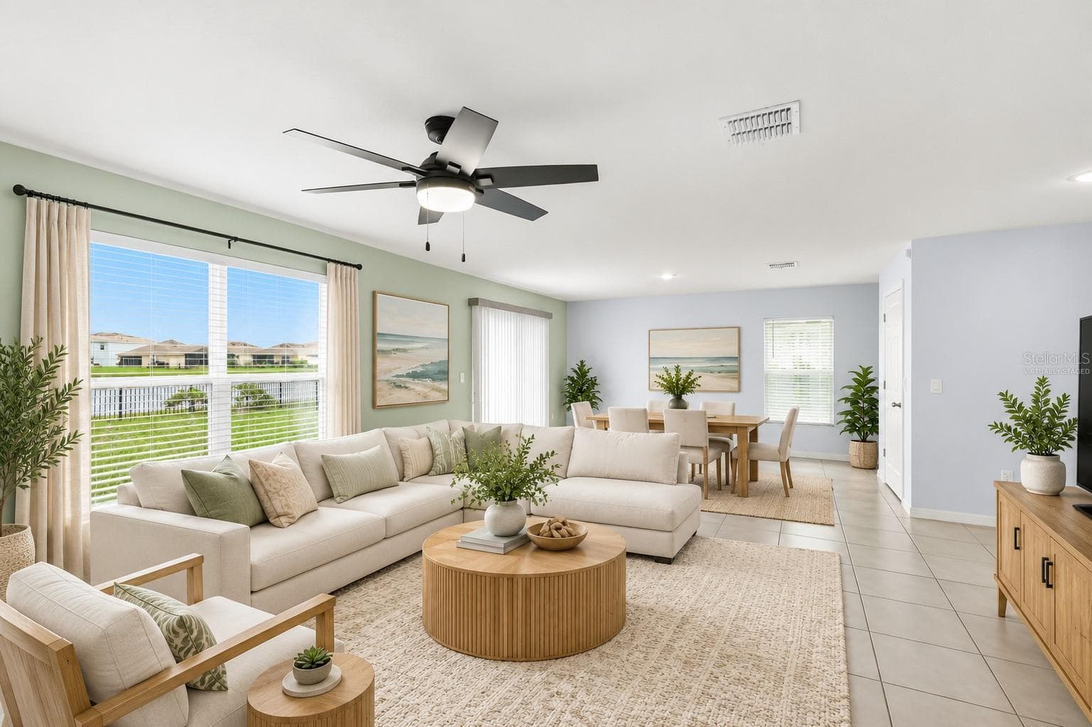 Virtually staged living room - 10116 CHARLOTTE DR, PARRISH