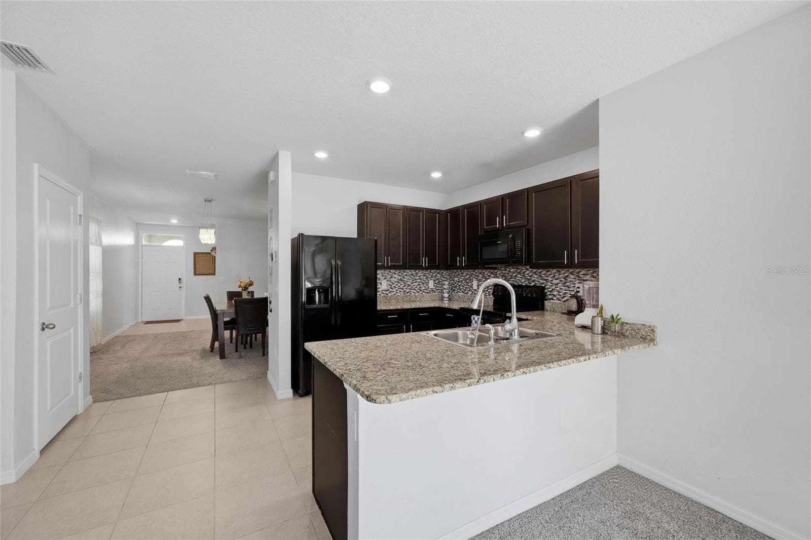 Single Family Residence at 8204 PELICAN REED CIR, WESLEY CHAPEL, photo 8 of 32