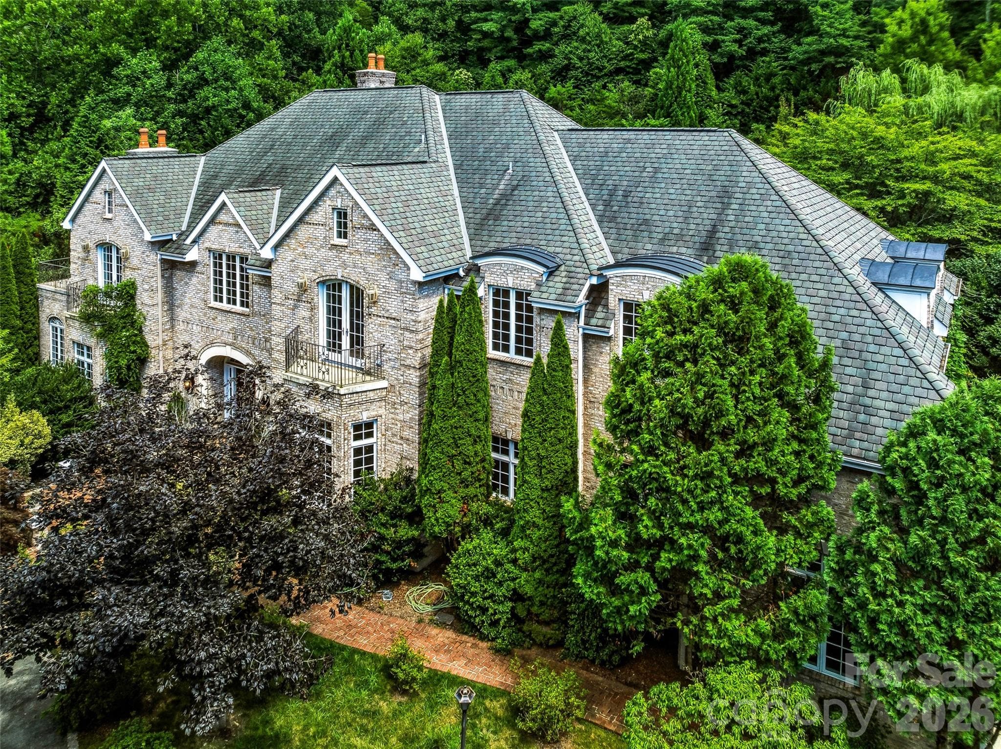 43 acres of privacy. One extraordinary estate. Thedriveway is just the beginning. - 150 Rainbow View Drive, Fletcher