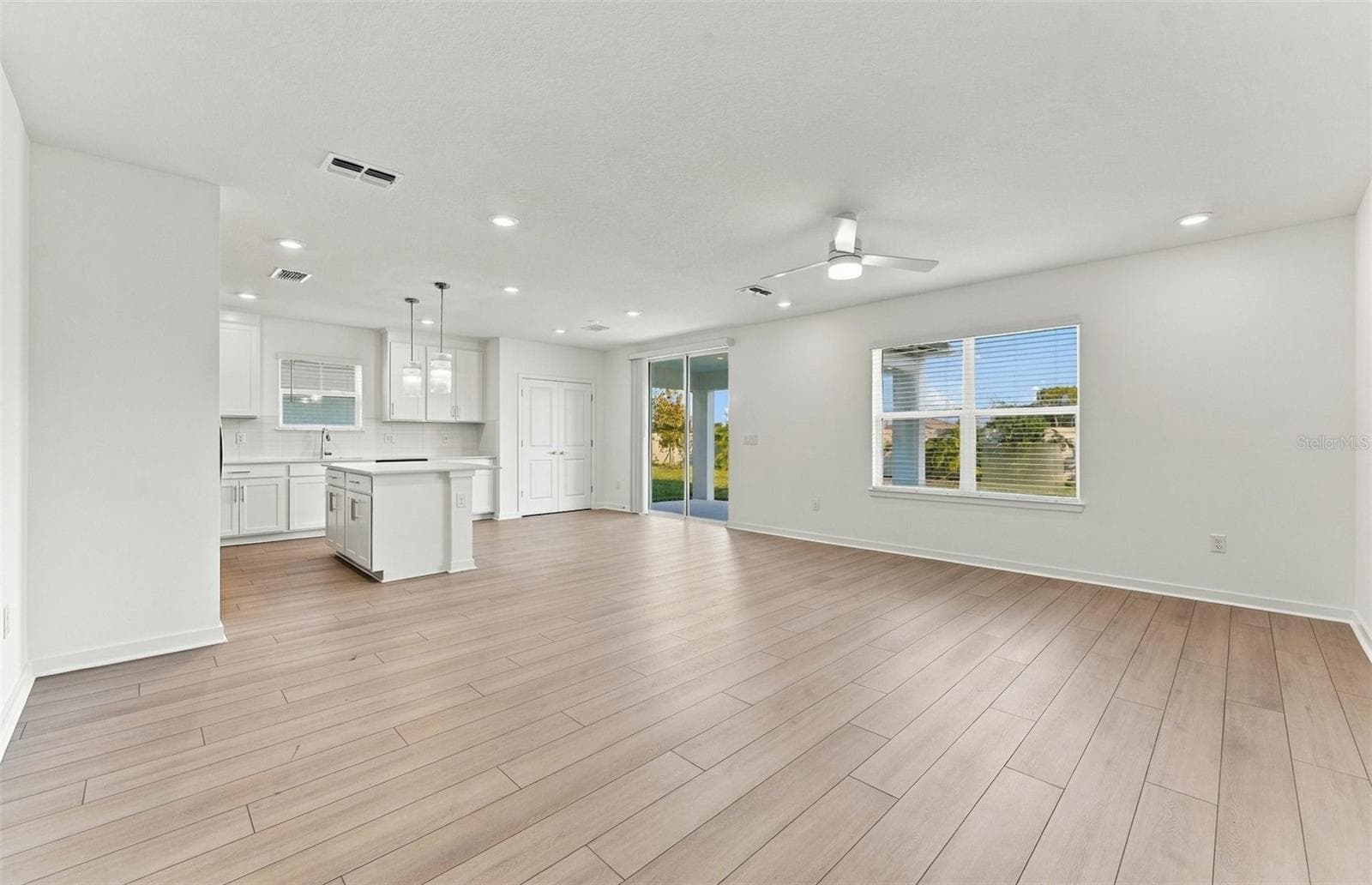 Open Kitchen to Cafe to Gathering Room - 9748 CRESCENT MOON DR, RIVERVIEW