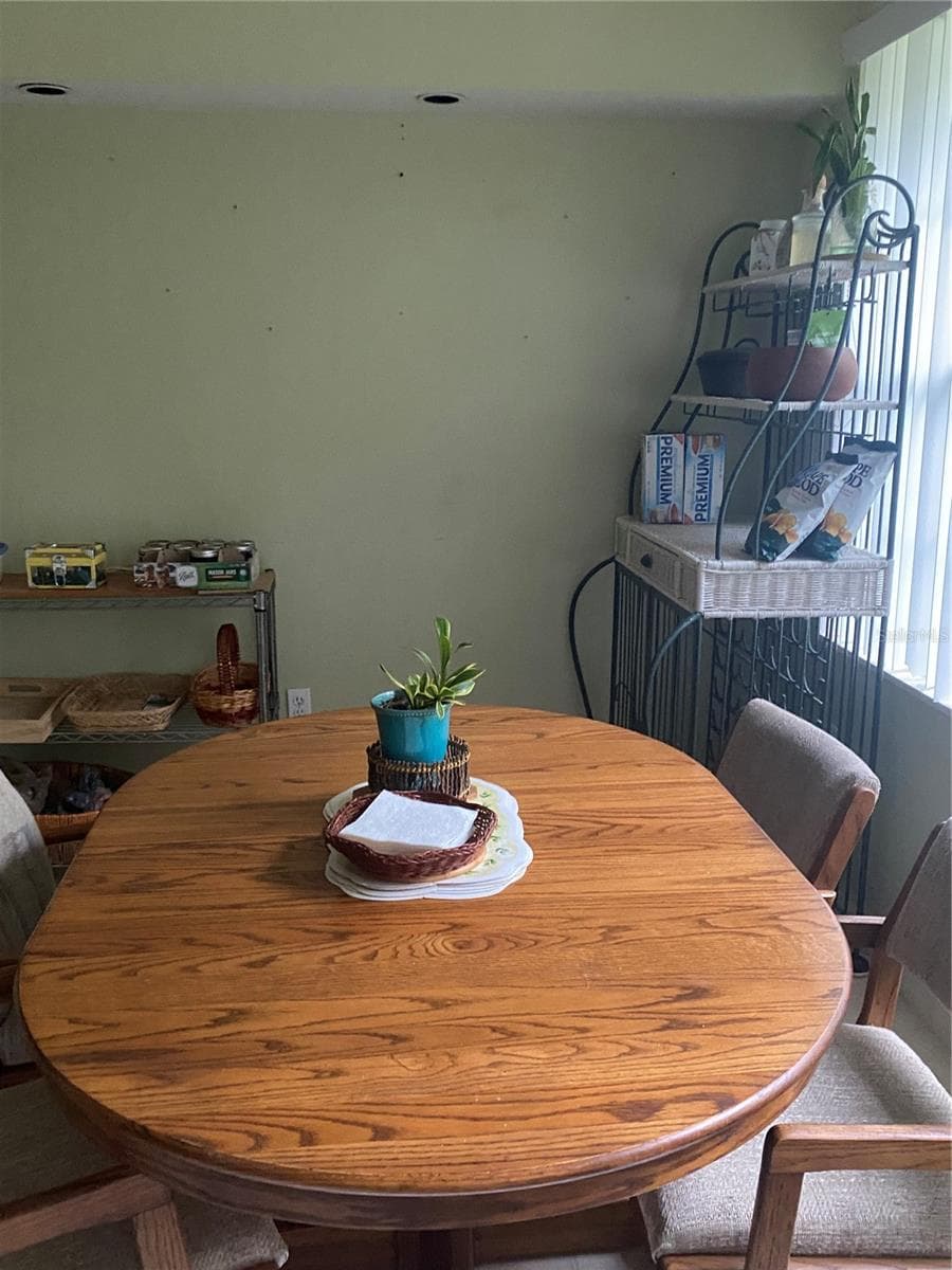 Breakfast nook area in the kitchen near the window - 11492 SW 82ND COURT RD, OCALA