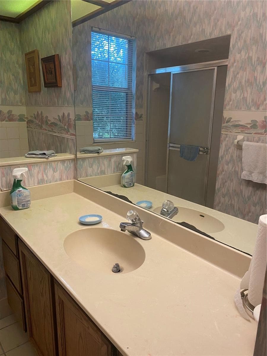 Guest bathroom vanity, plenty of space on the countertop. - 11492 SW 82ND COURT RD, OCALA
