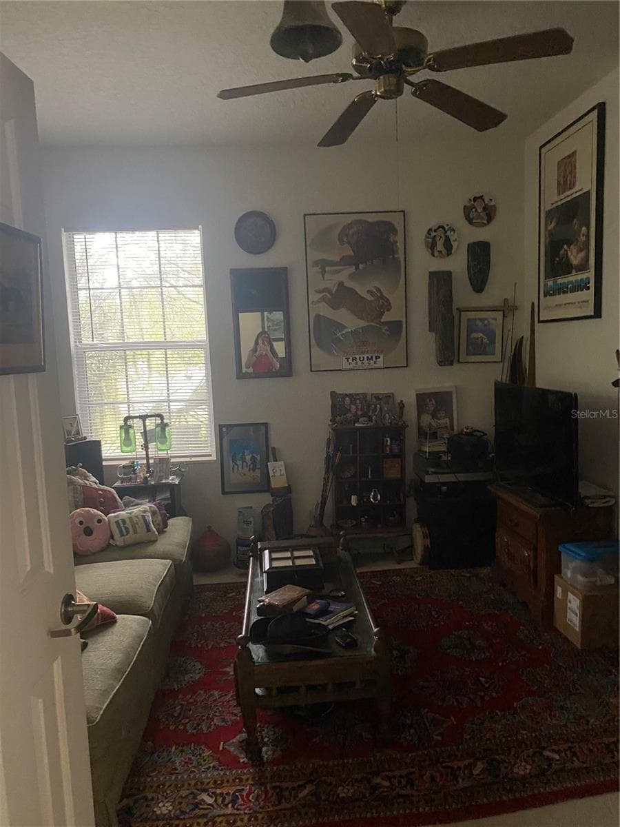 Den area with high ceiling, windows - 11492 SW 82ND COURT RD, OCALA