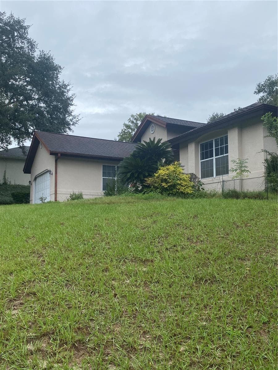 Front of the house side view. - 11492 SW 82ND COURT RD, OCALA