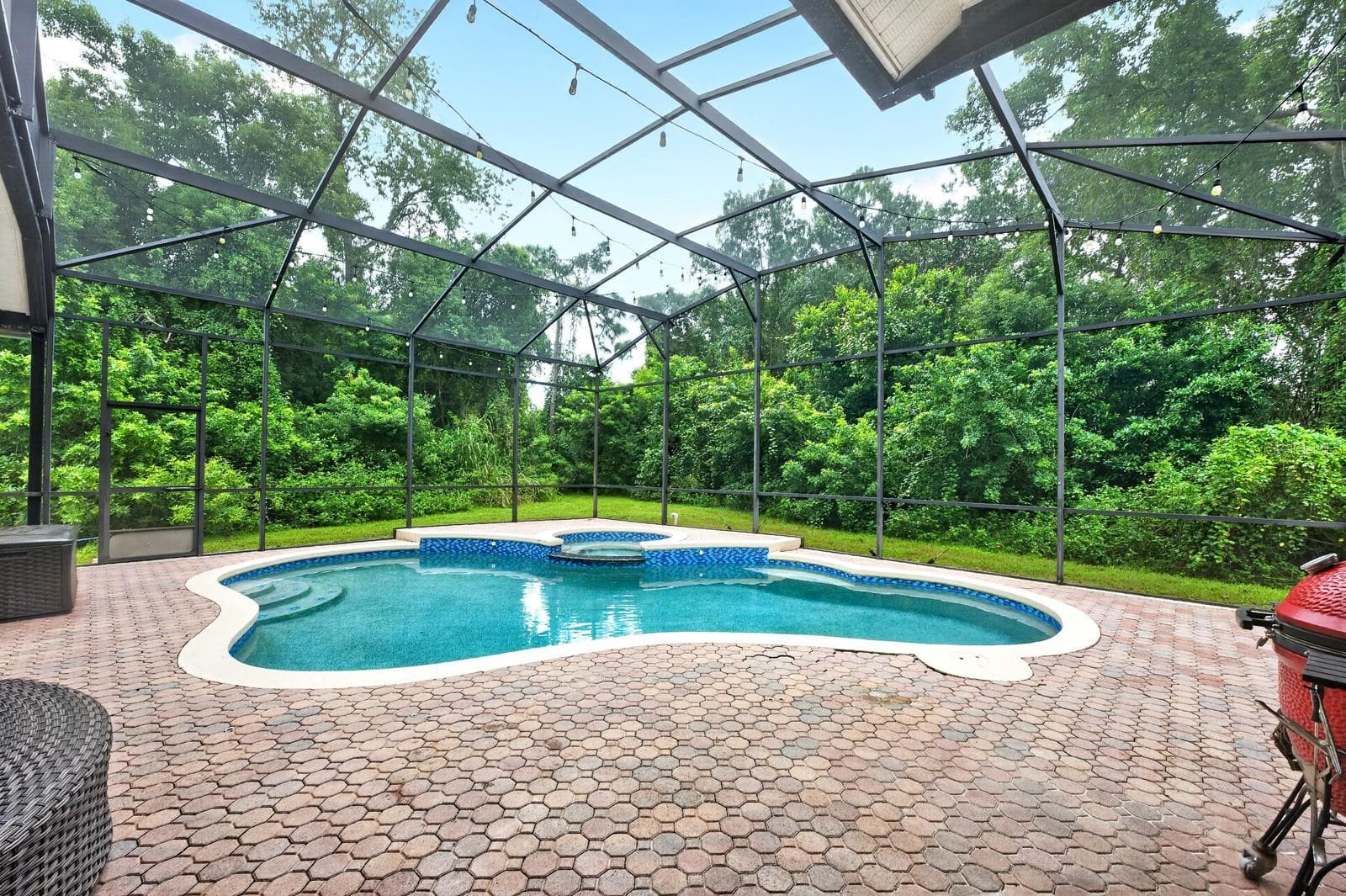 Private screeed pool and spa surrounded by beautiful mature trees. - 609 VIANA CT, WINTER SPRINGS