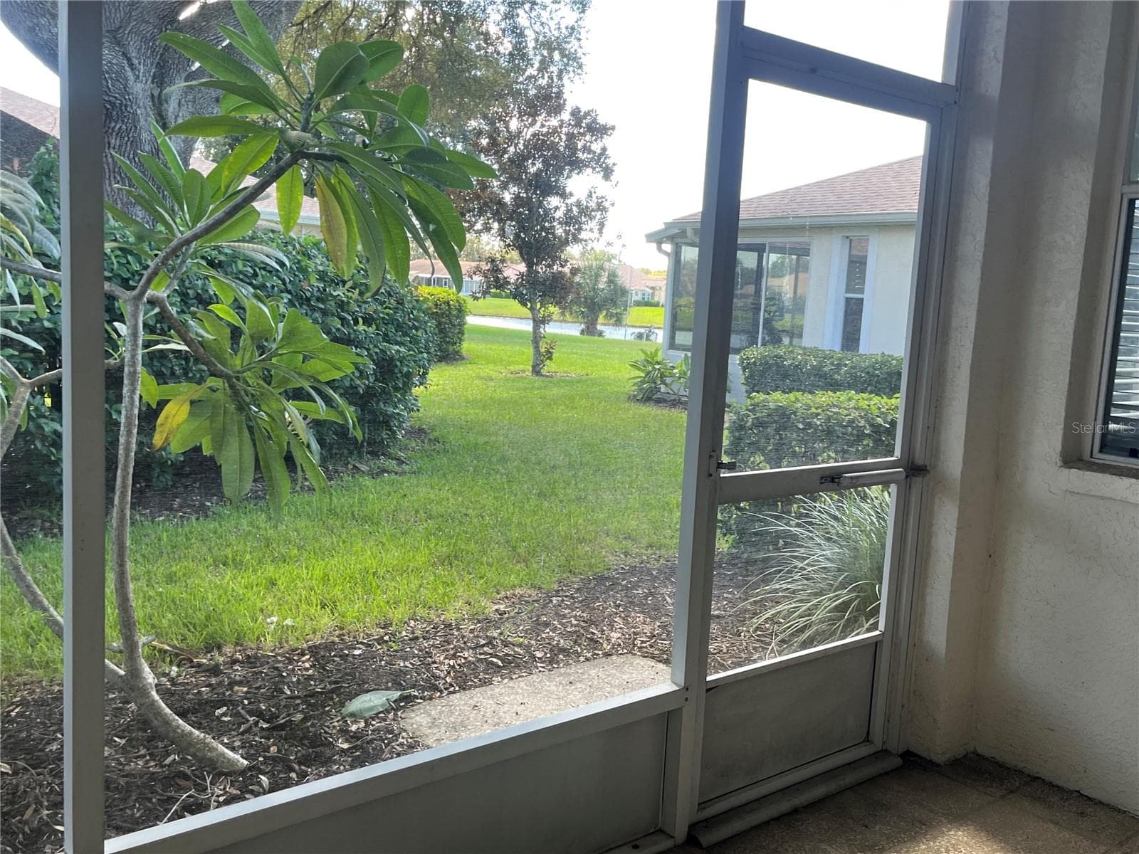 Water view from lanai - 2617 NEWCOMB CT, SUN CITY CENTER