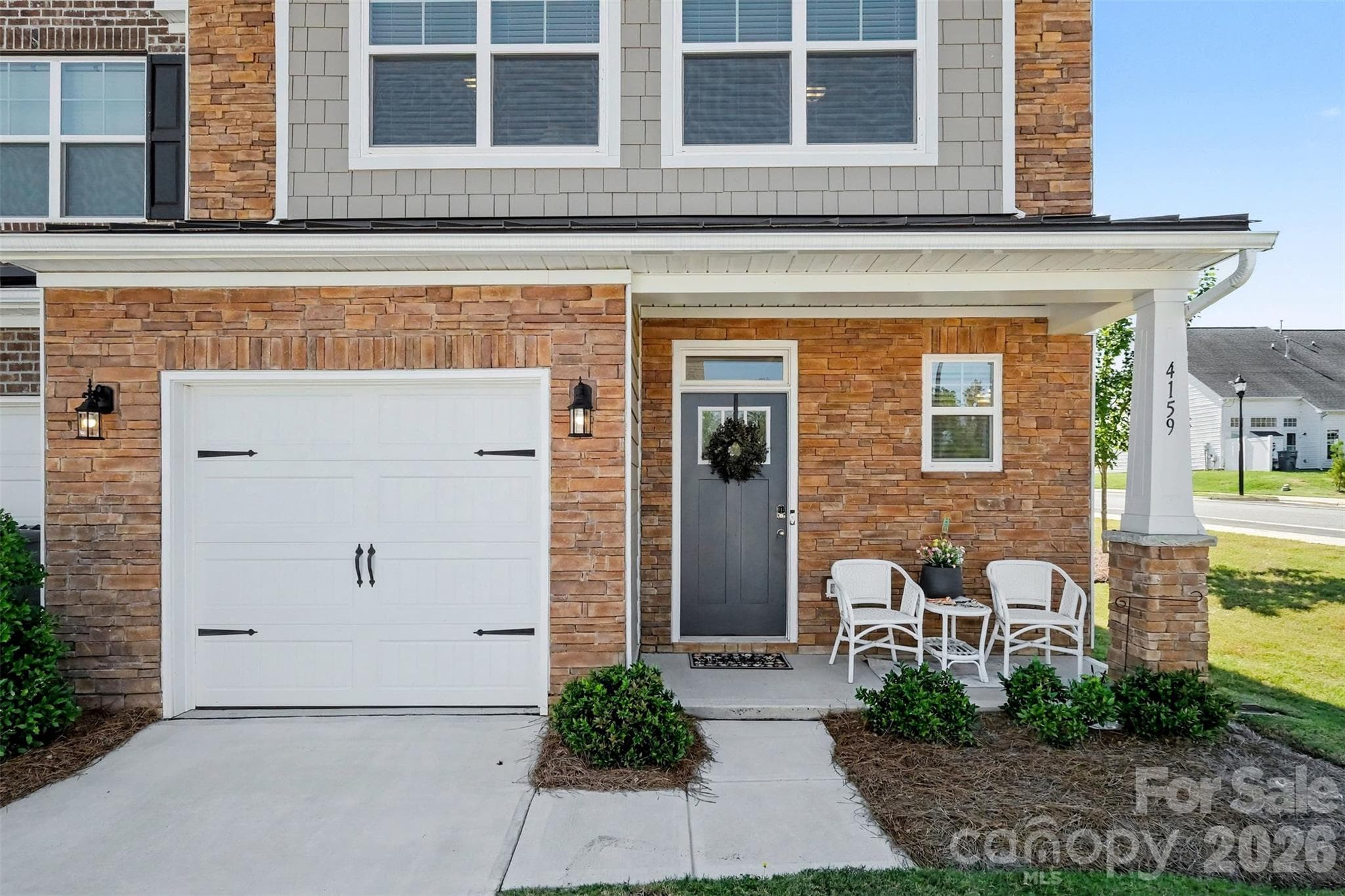 Watch the world go by on your front porch. - 4159 Black Court, Harris