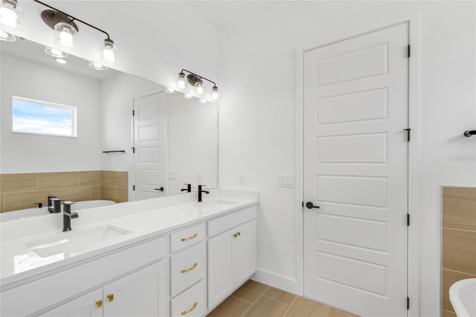 Primary bathroom (representative photo) - 17590 JAPONICA BLOOM DR, WINTER GARDEN