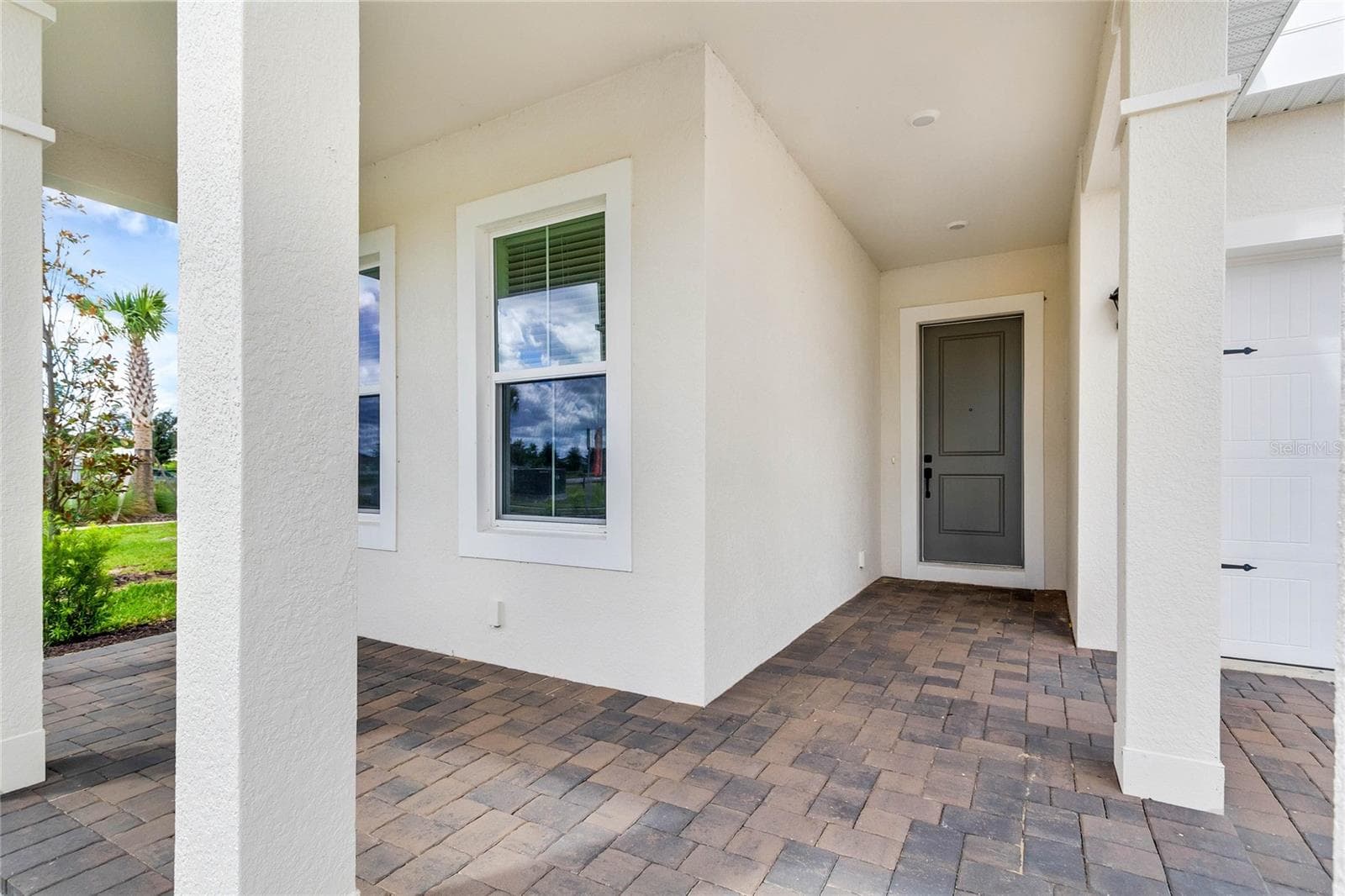 Front porch (representative photo) - 17590 JAPONICA BLOOM DR, WINTER GARDEN