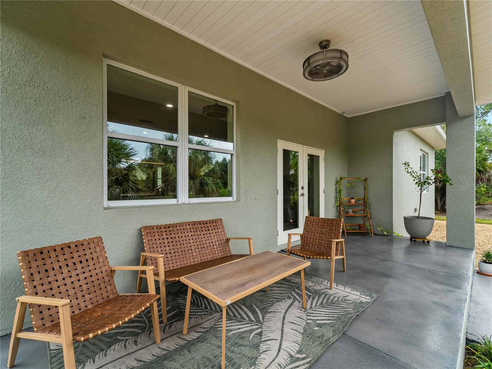 CoveredPatio_8163WalbertSt_PortCharlotte_OutdoorLiving_Close.jpg - 8163 WALBERT ST, PORT CHARLOTTE