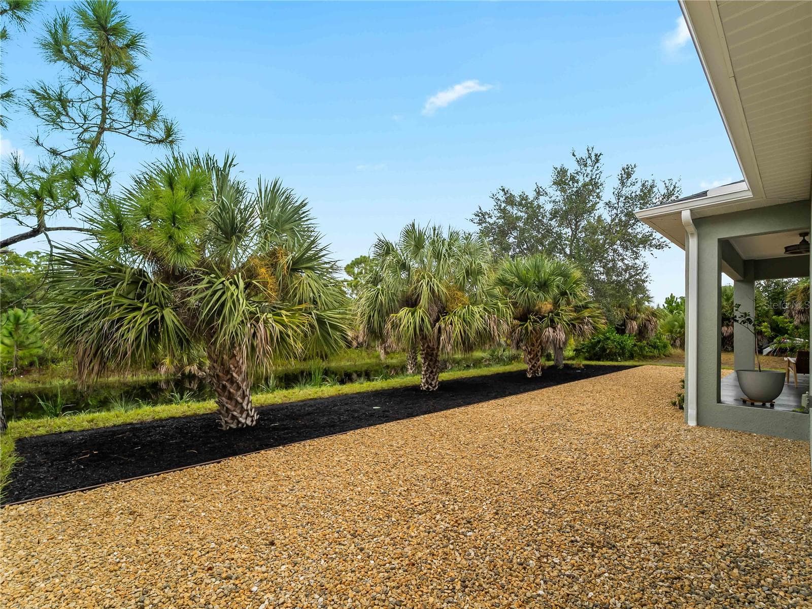 Backyard_8163WalbertSt_PortCharlotte_TropicalLandscaping_Wide.jpg - 8163 WALBERT ST, PORT CHARLOTTE