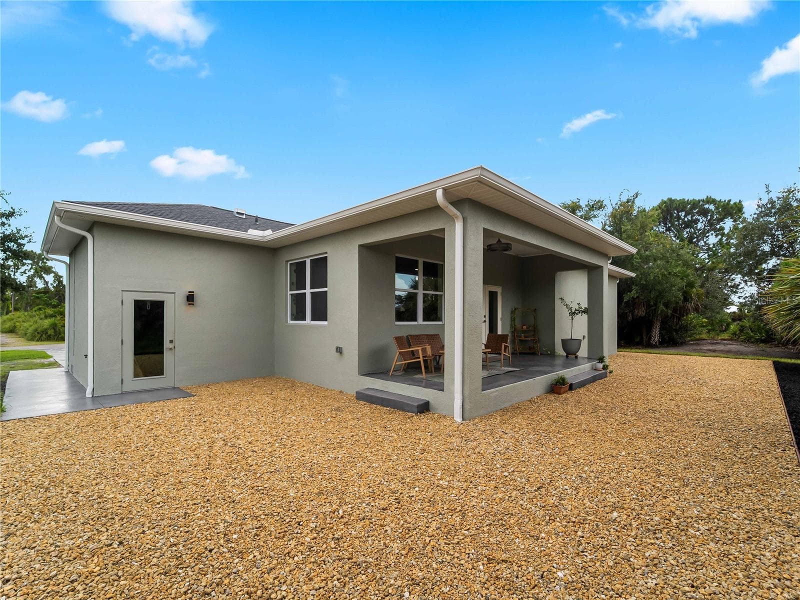 RearExterior_8163WalbertSt_PortCharlotte_Wide.jpg - 8163 WALBERT ST, PORT CHARLOTTE