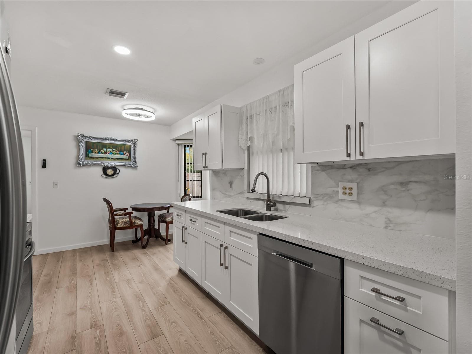 Kitchen_20307SilentAve_PortCharlotte_WhiteCabinetry_Wide.jpg - 20307 SILENT AVE, PORT CHARLOTTE