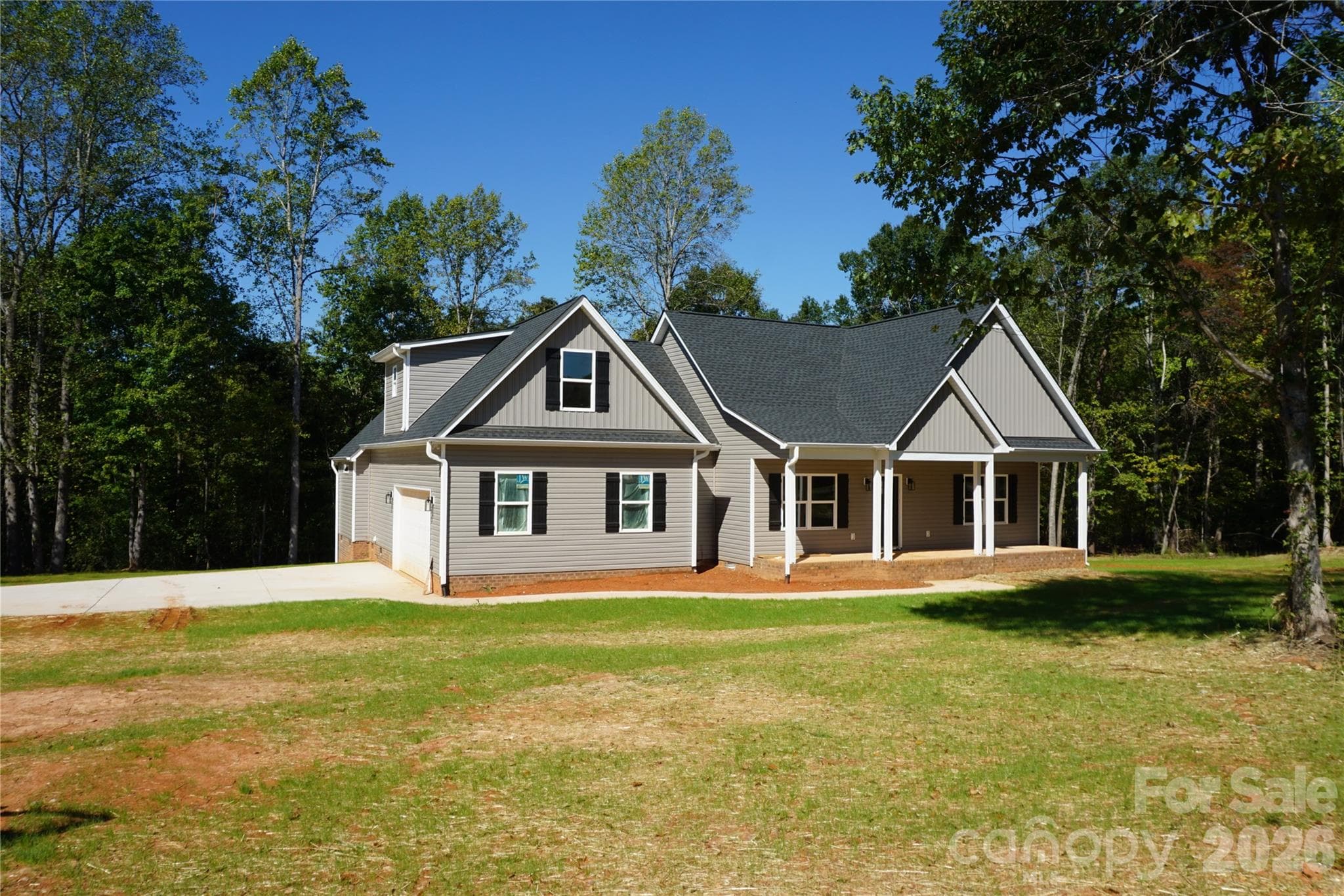 Home sits off the road on a 1.4 +/- acre lot. - 989 Rhyne Road, Clover