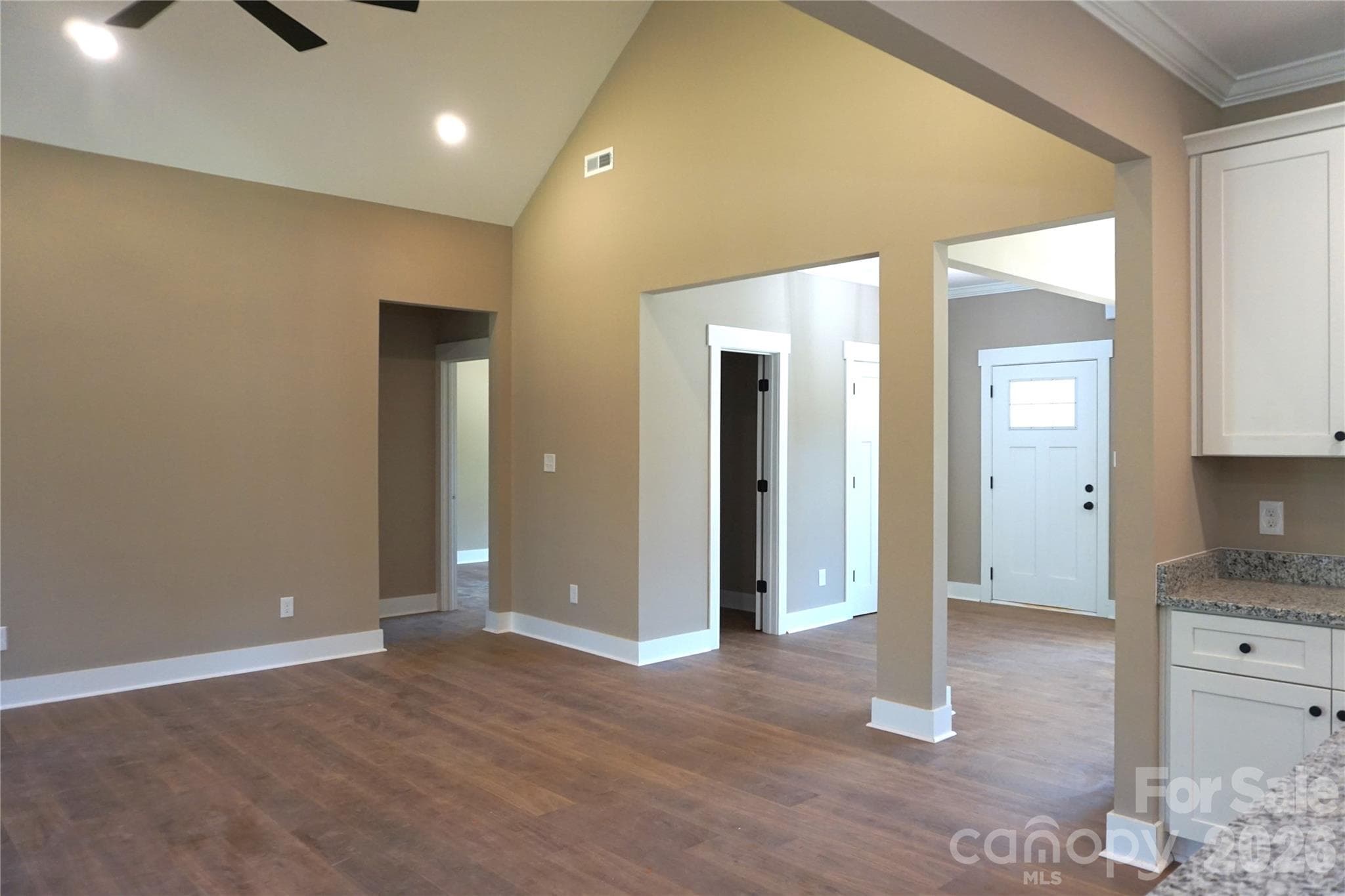 Entrance to the home with a half bath located in the foyer along with a large coat closet. - 989 Rhyne Road, Clover