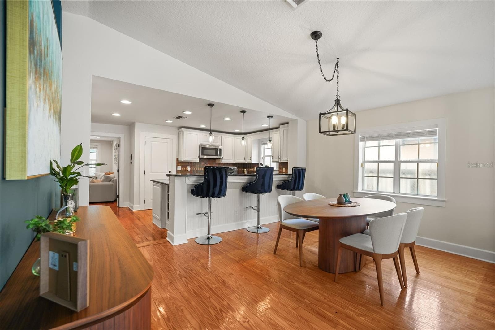 Living room with sliding glass doors to the rear deck - 11 S LAWSONA BLVD, ORLANDO