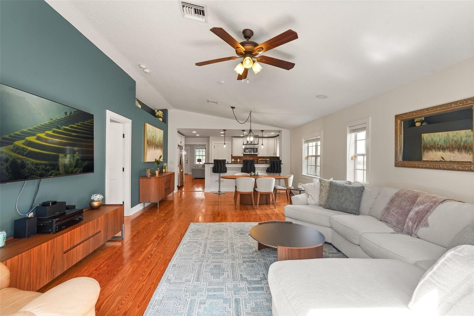 Living room view toward the dining area and kitchen - 11 S LAWSONA BLVD, ORLANDO
