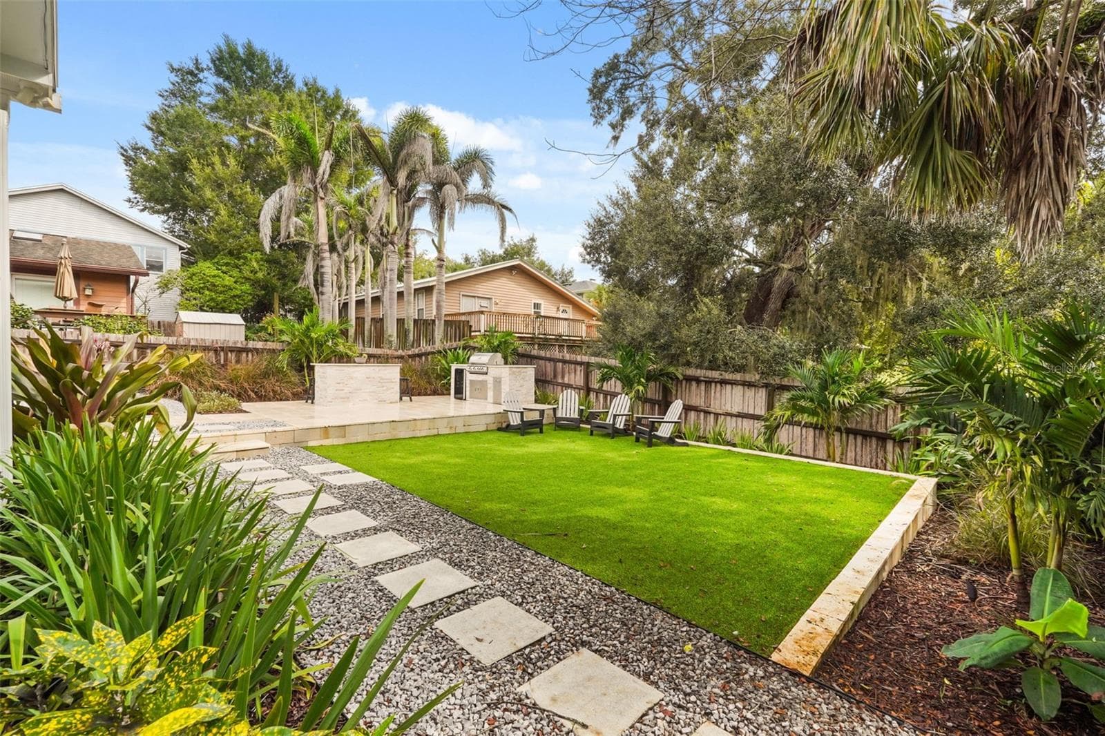 Backyard turf with stepping stone path - 11 S LAWSONA BLVD, ORLANDO
