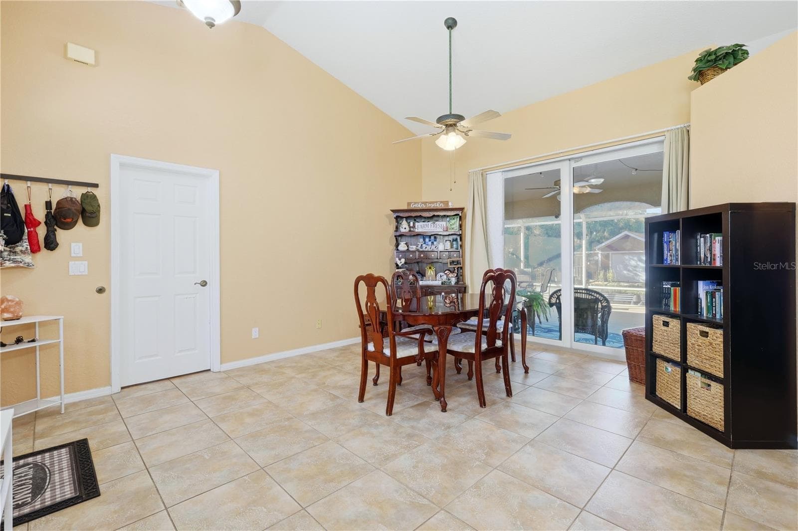 Dining room with sliders out to screen lania - 4732 FLINT DR, NORTH PORT