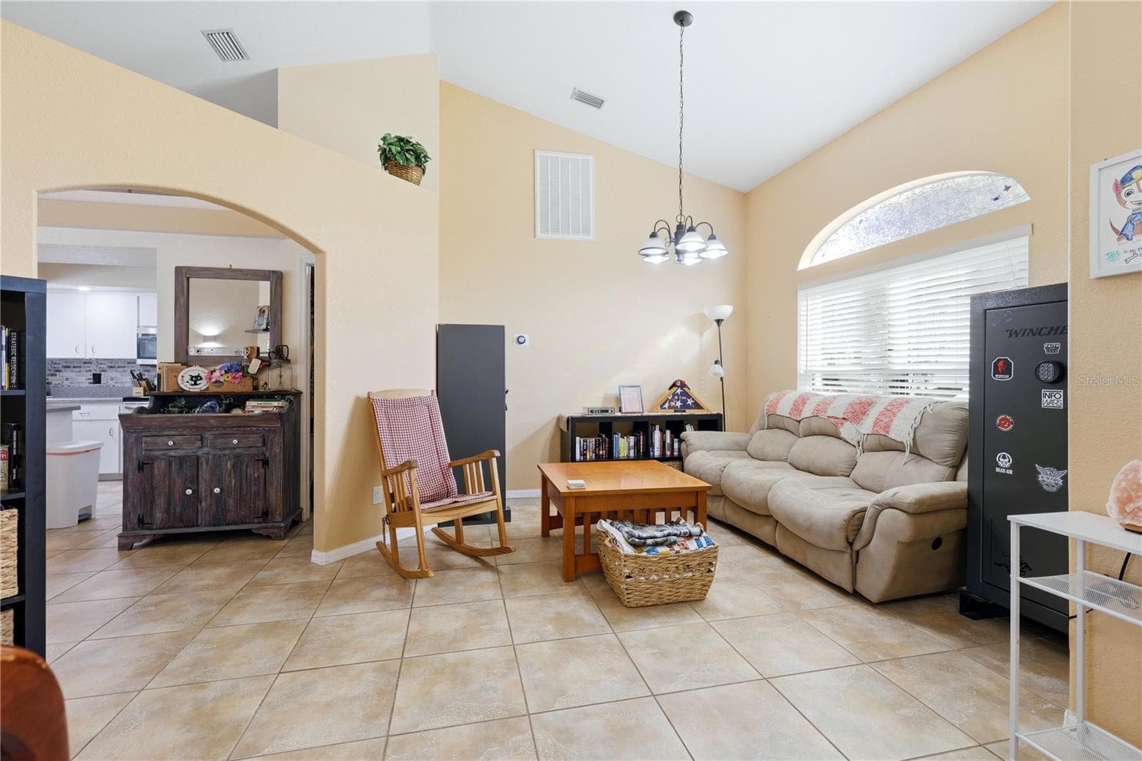 Living room with vaulted ceilings - 4732 FLINT DR, NORTH PORT