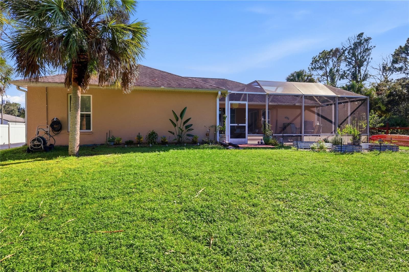 rear view of home - 4732 FLINT DR, NORTH PORT