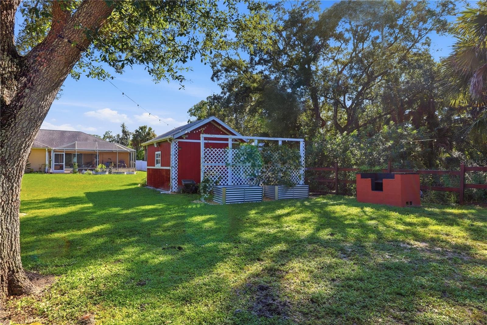 rear view of home from back of property - 4732 FLINT DR, NORTH PORT