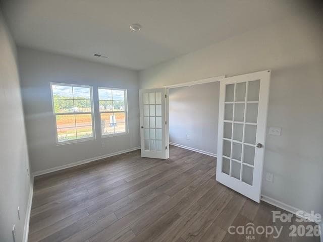 This home features a office on the main floor at entry way - 4025 Juno Drive, Charlotte