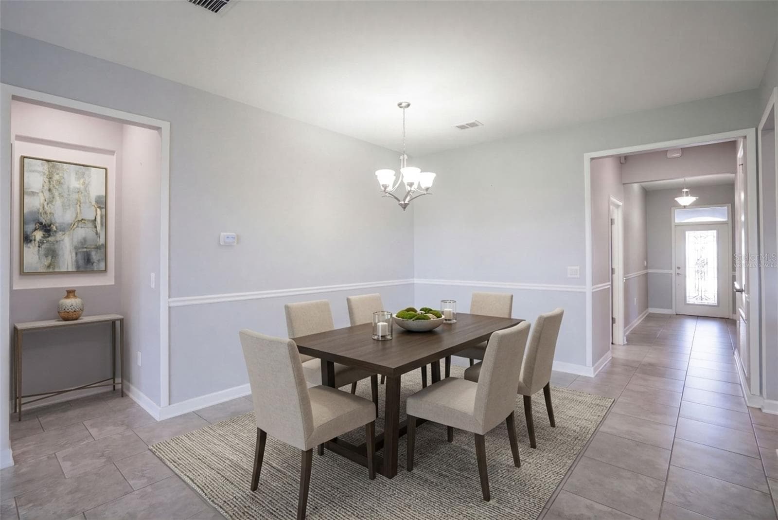 Virtually staged dining room - 3516 KINLEY BROOKE LN, CLERMONT