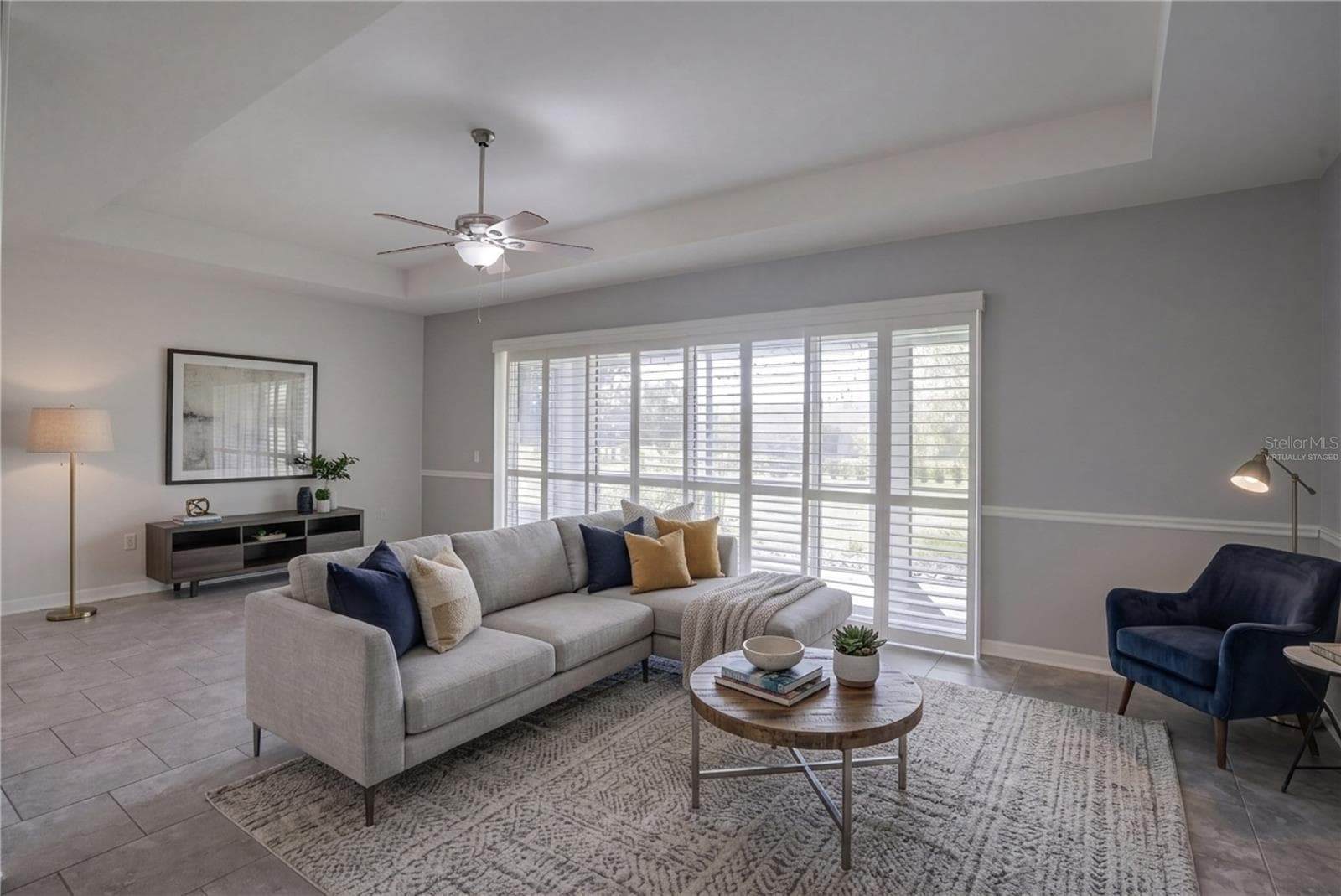 Virtually staged family room - 3516 KINLEY BROOKE LN, CLERMONT