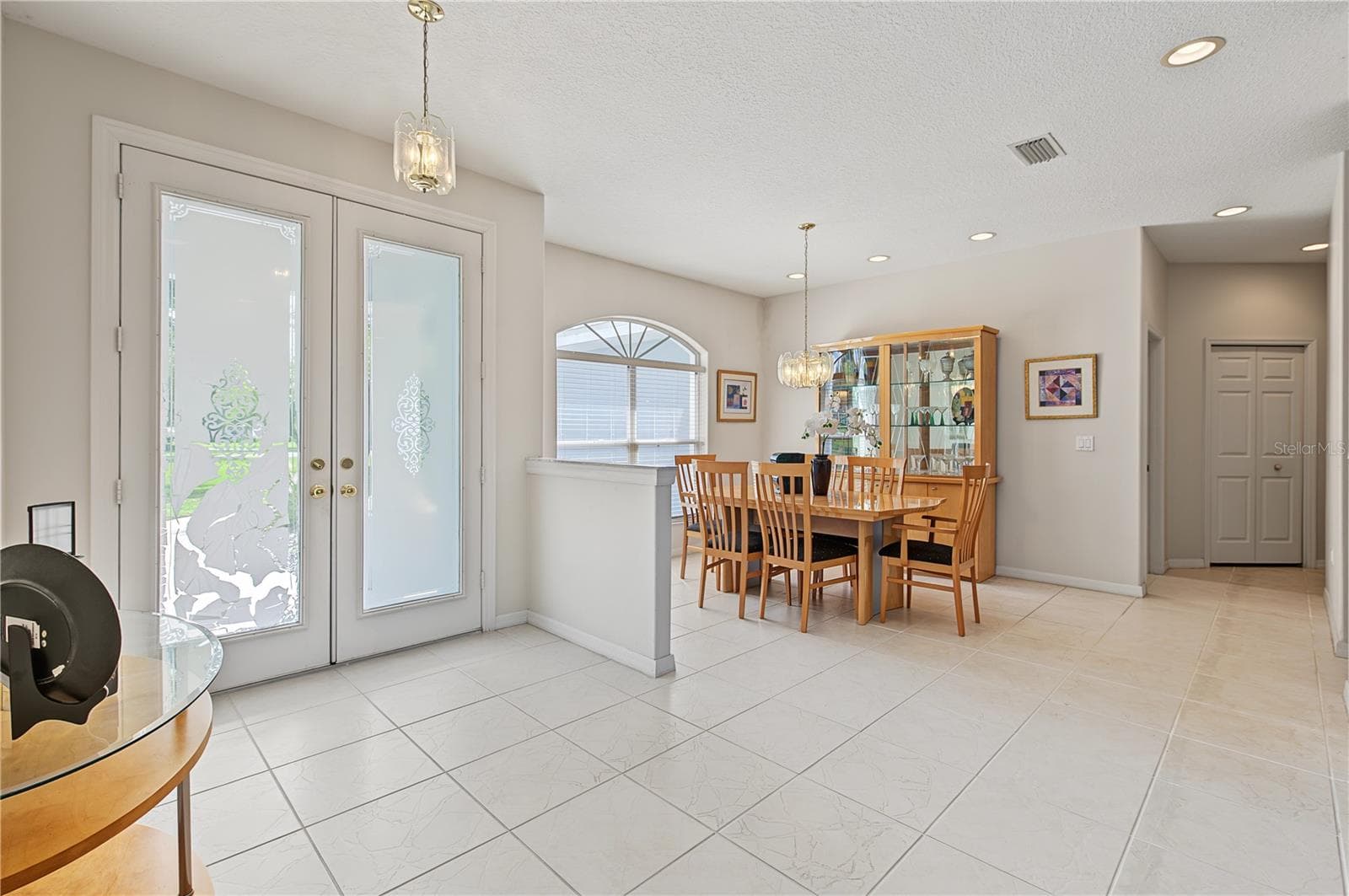 Double Front Doors open to the Dining Room - 915 LAKE THOMAS LN, LUTZ