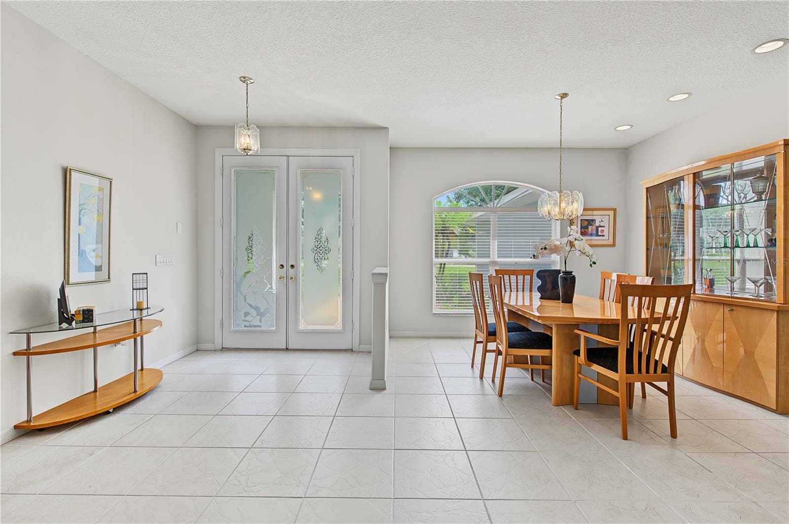 Dining Room area with lots of sunlight open to the foyer and the Living Room. - 915 LAKE THOMAS LN, LUTZ