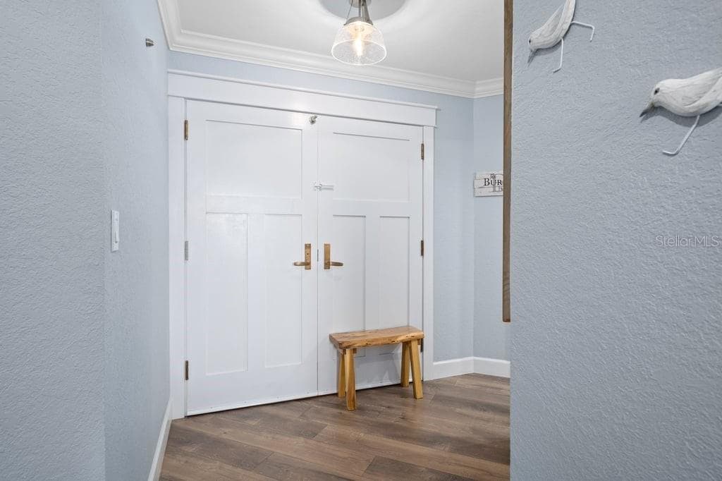 Double door with shaker trim. - 1660 GULF BLVD #706, CLEARWATER