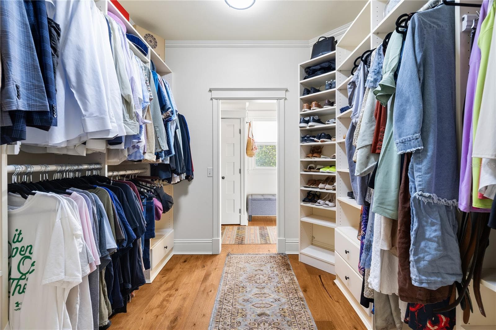 open custom closet in primary - 5903 RIVER FOREST CIR, BRADENTON