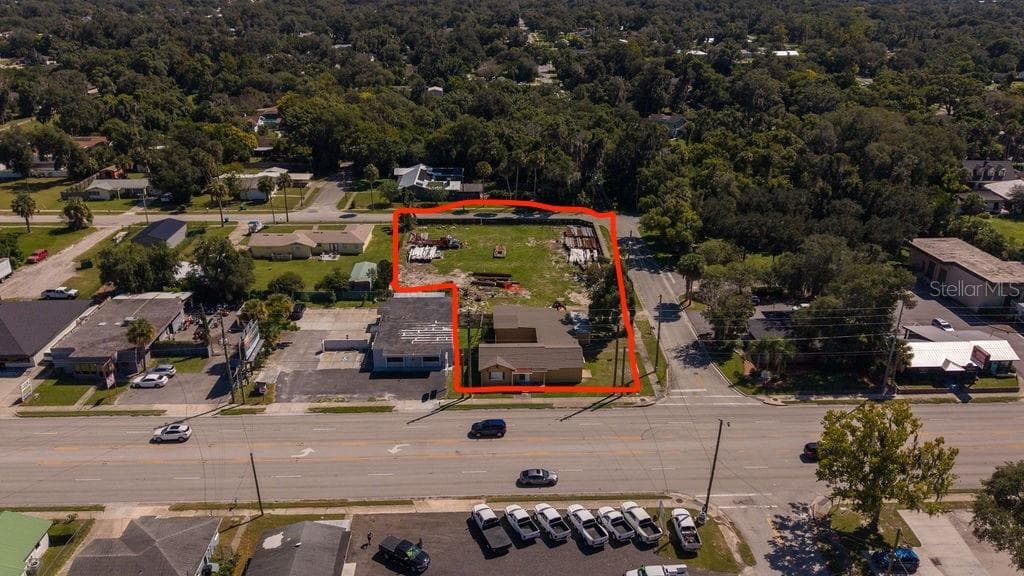 Front of parcel facing 15-A. Excellent exposure along S Spring Garden Avenue (SR 15A), with approximately 24,000 vehicles daily according to FDOT’s 2025 annual average daily traffic data for the surrounding roadway segment. - 219 S SPRING GARDEN AVE, DELAND
