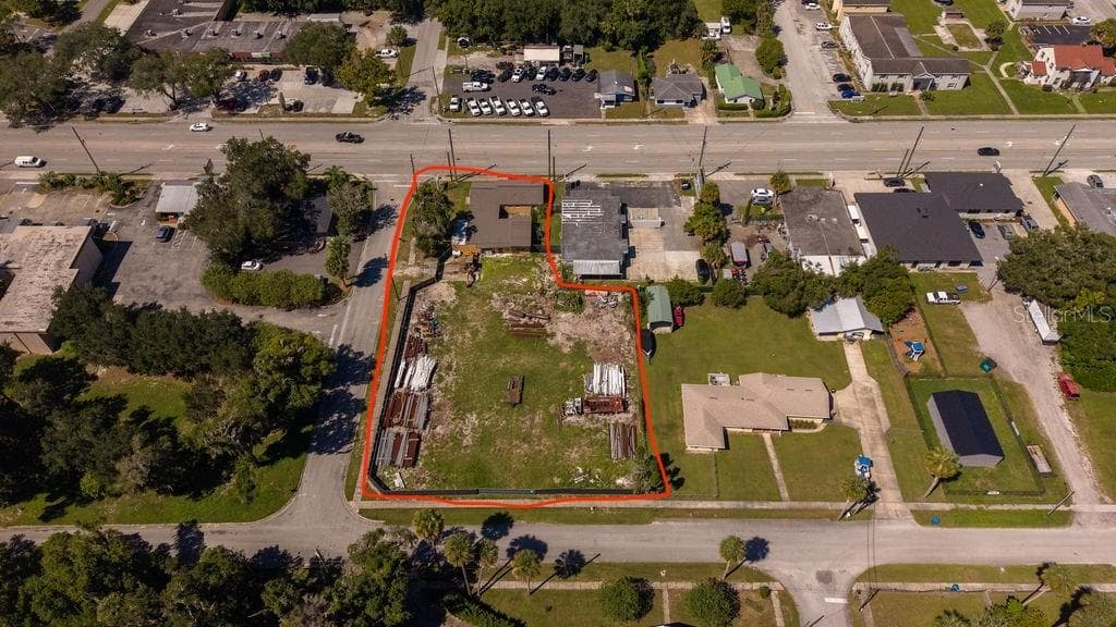 Aerial of entire parcel with frontage on 3 streets: 15-A, Voorhis and Dexter. - 219 S SPRING GARDEN AVE, DELAND