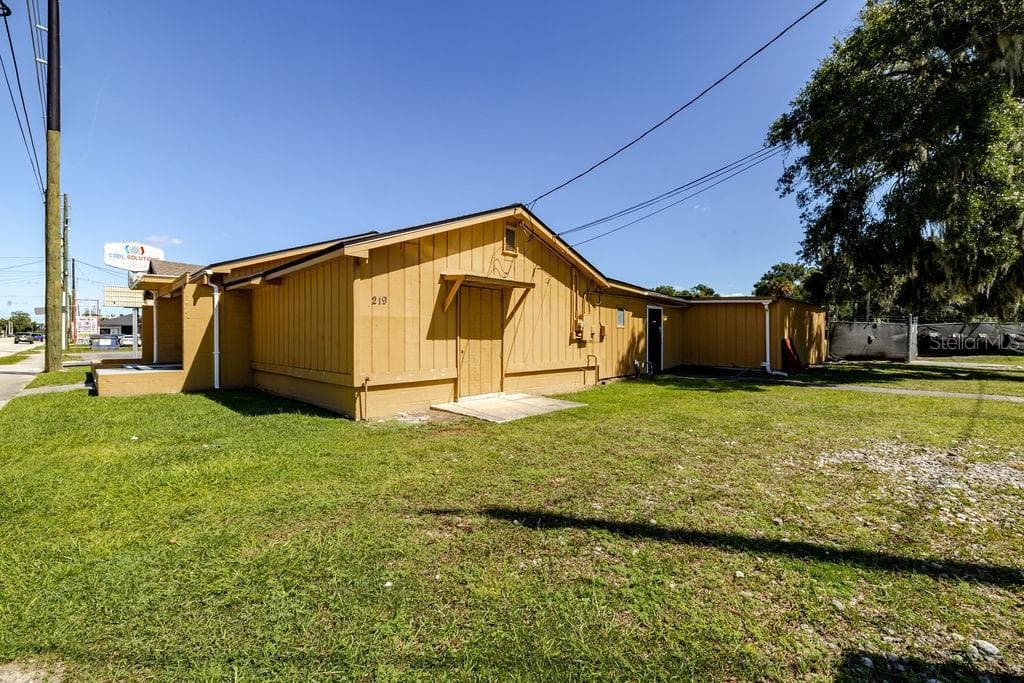 South side of building. - 219 S SPRING GARDEN AVE, DELAND