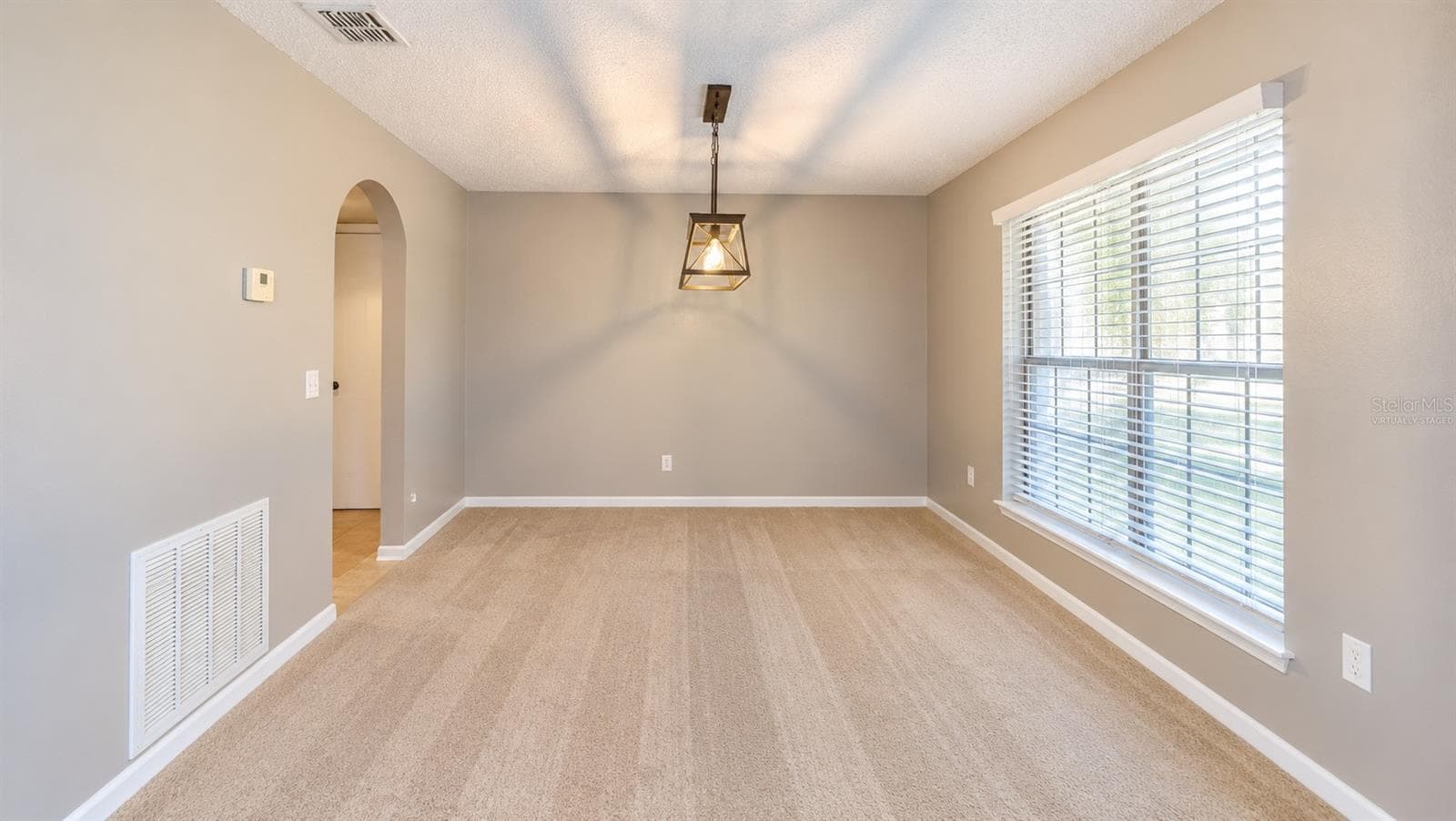Dinning Room/virtually staged - 11083 MAYBIRD AVE, WEEKI WACHEE