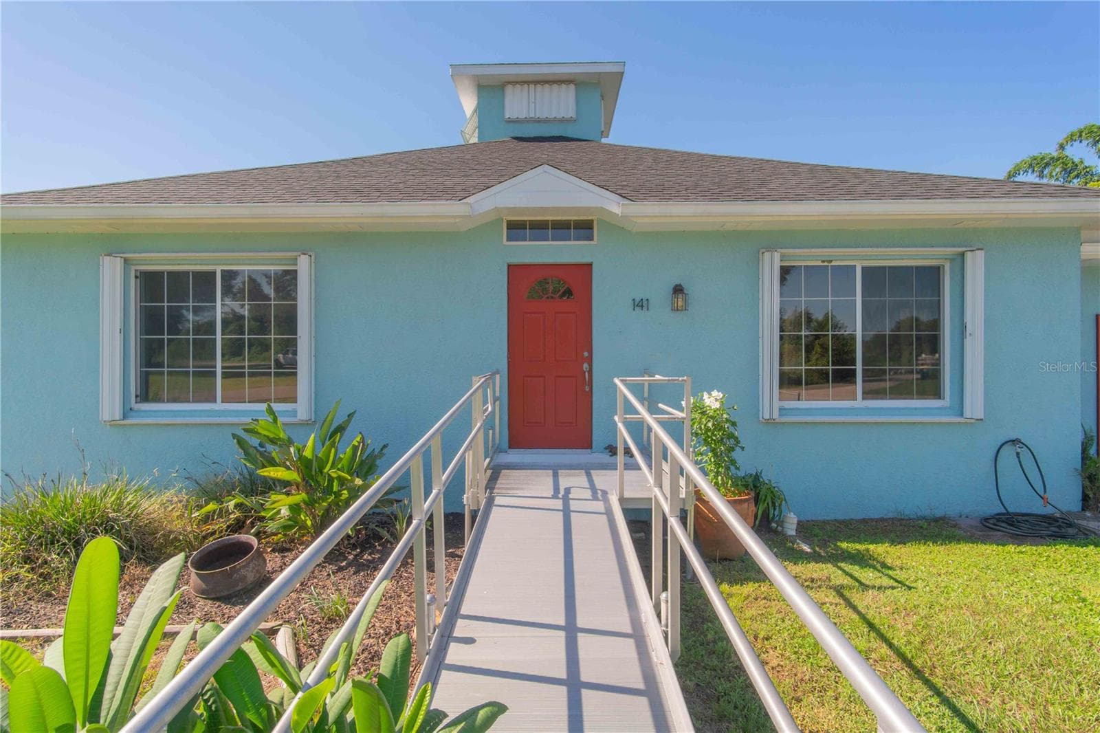 Front exterior entrance - 141 SUMMERSET DR, PUNTA GORDA