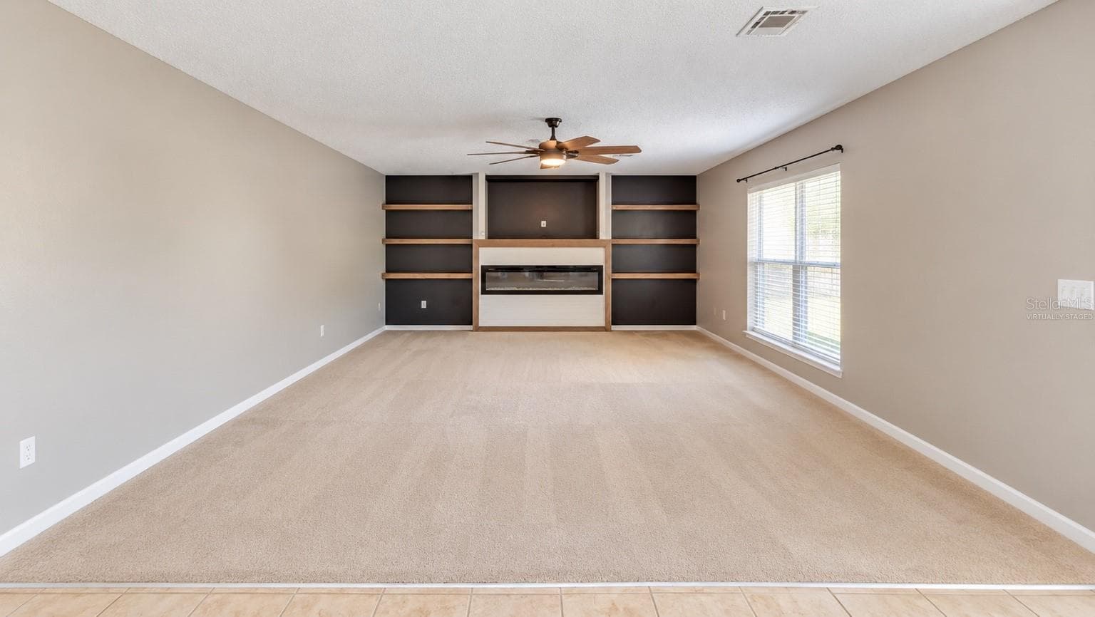 Large Living Room/ Virtually Staged - 11083 MAYBIRD AVE, WEEKI WACHEE