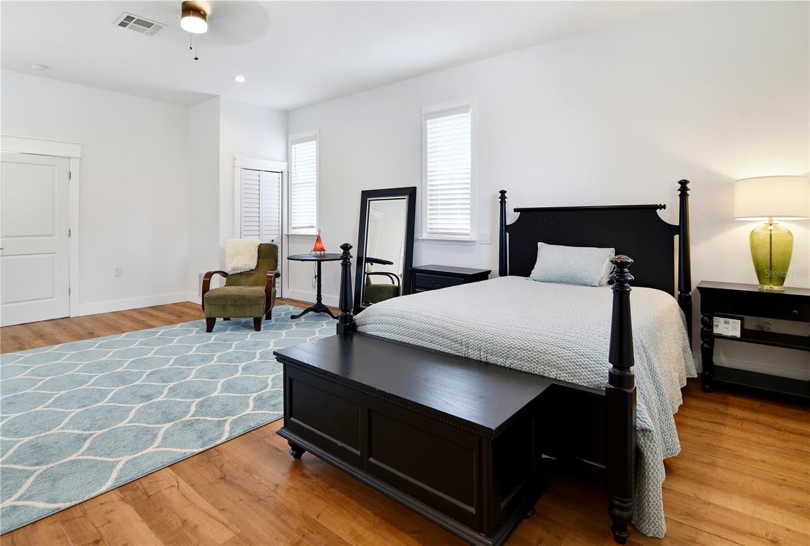Expansive upstairs primary bedroom with plenty of space for a seating or work area. - 1611 CHESTNUT AVE, WINTER PARK