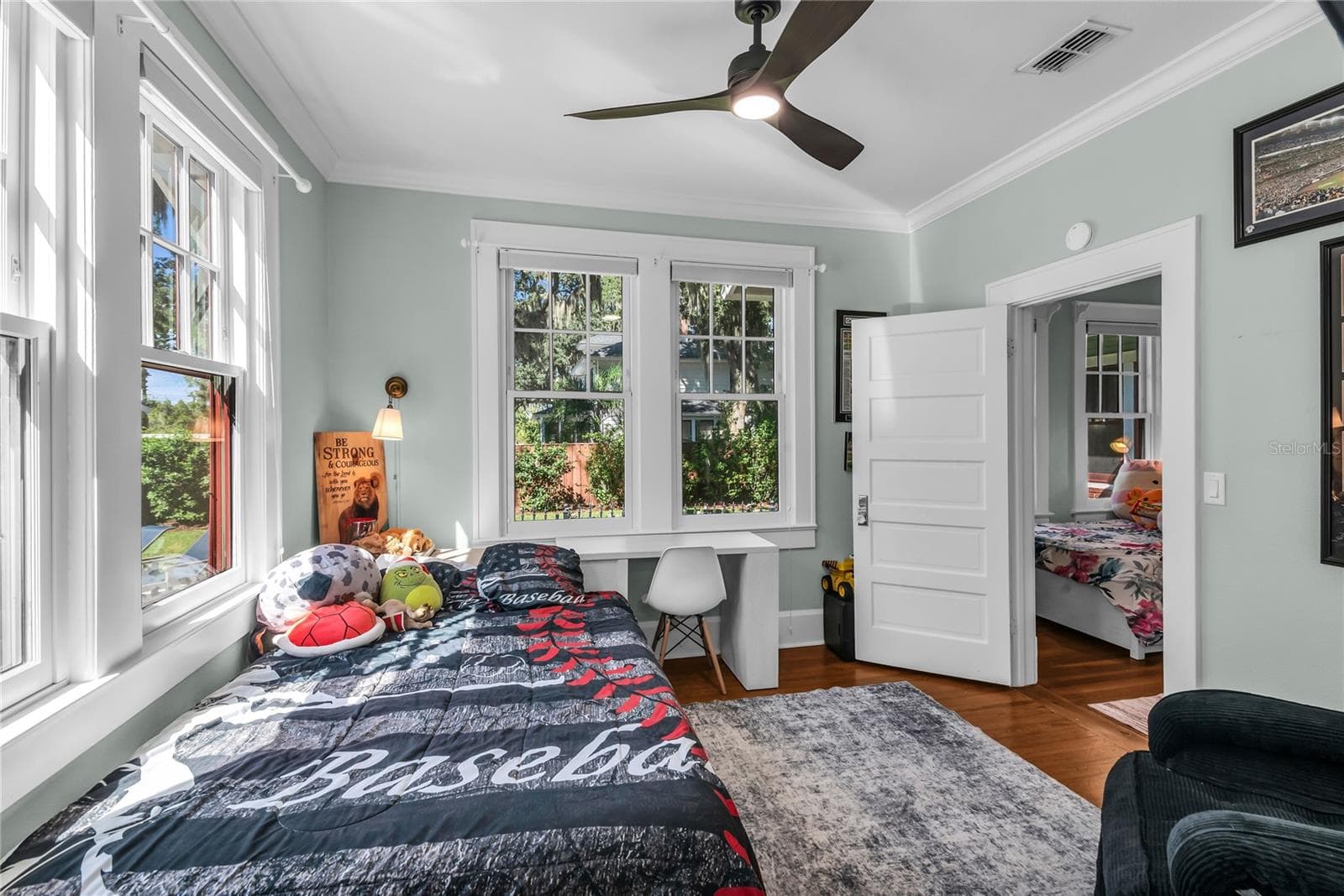 Bedroom 4 overlooks pool with ensuite bath - 234 N LAKEVIEW AVE, WINTER GARDEN